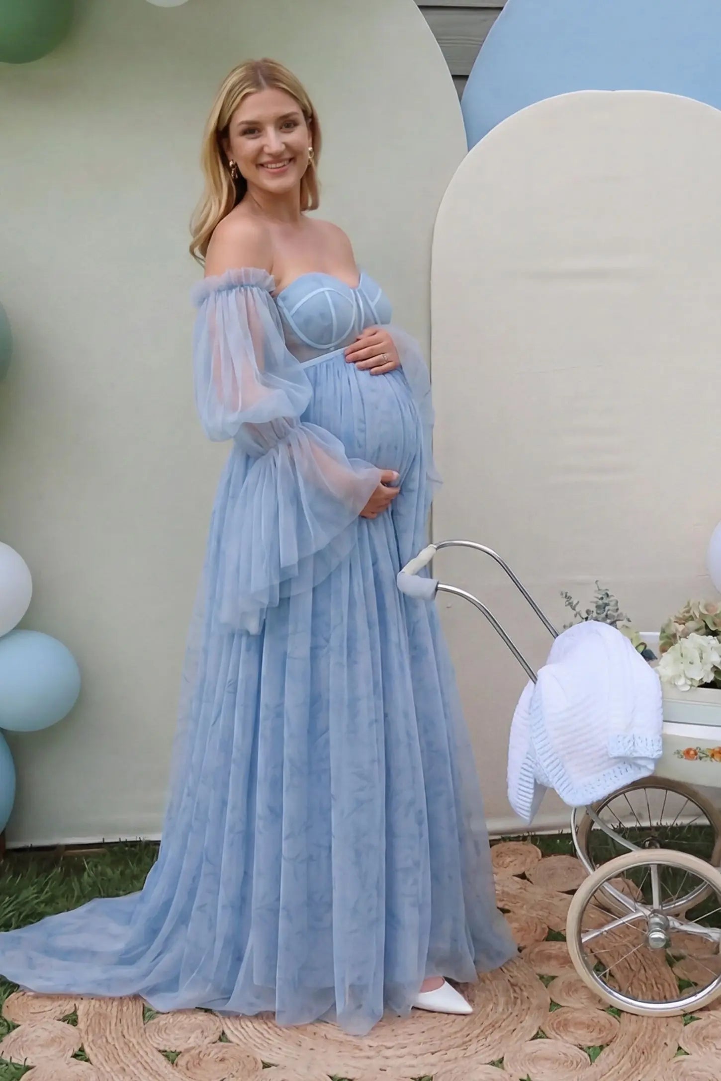 Organza Tie-Back Off-Shoulder Maternity Gown in Blue featuring a sweeping train on a pregnant model.