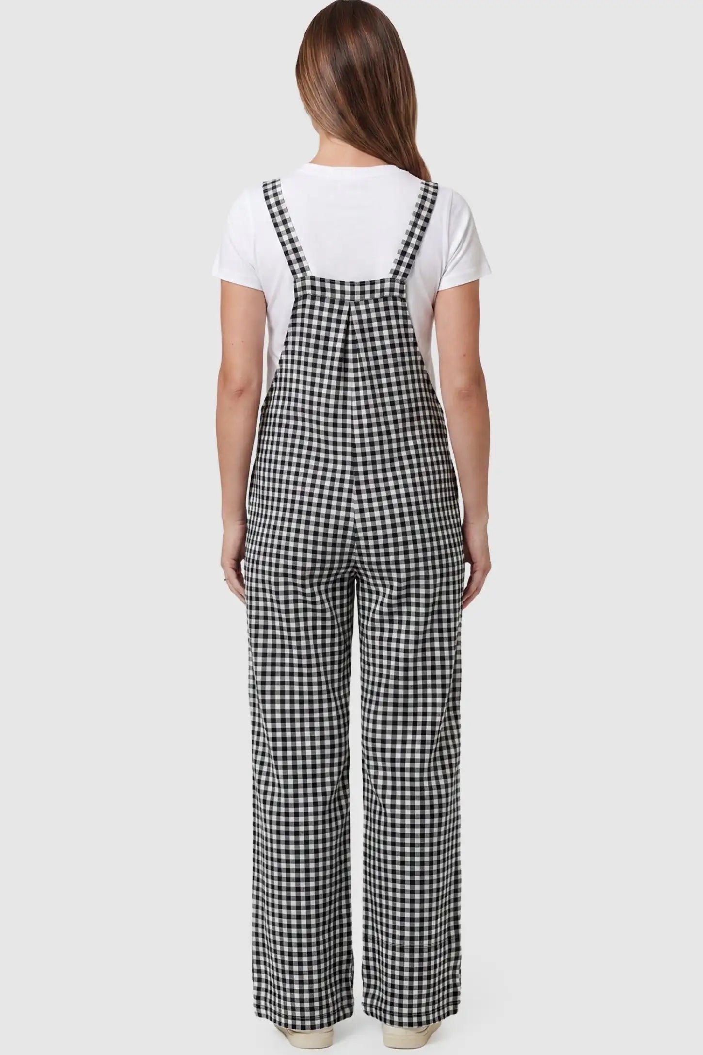 Plaid Square-Neck Button-Detail Maternity Jumpsuit Plaid Square-Neck Button-Detail Maternity Jumpsuit in Black featuring wide-leg trousers on a pregnant model in a back view.