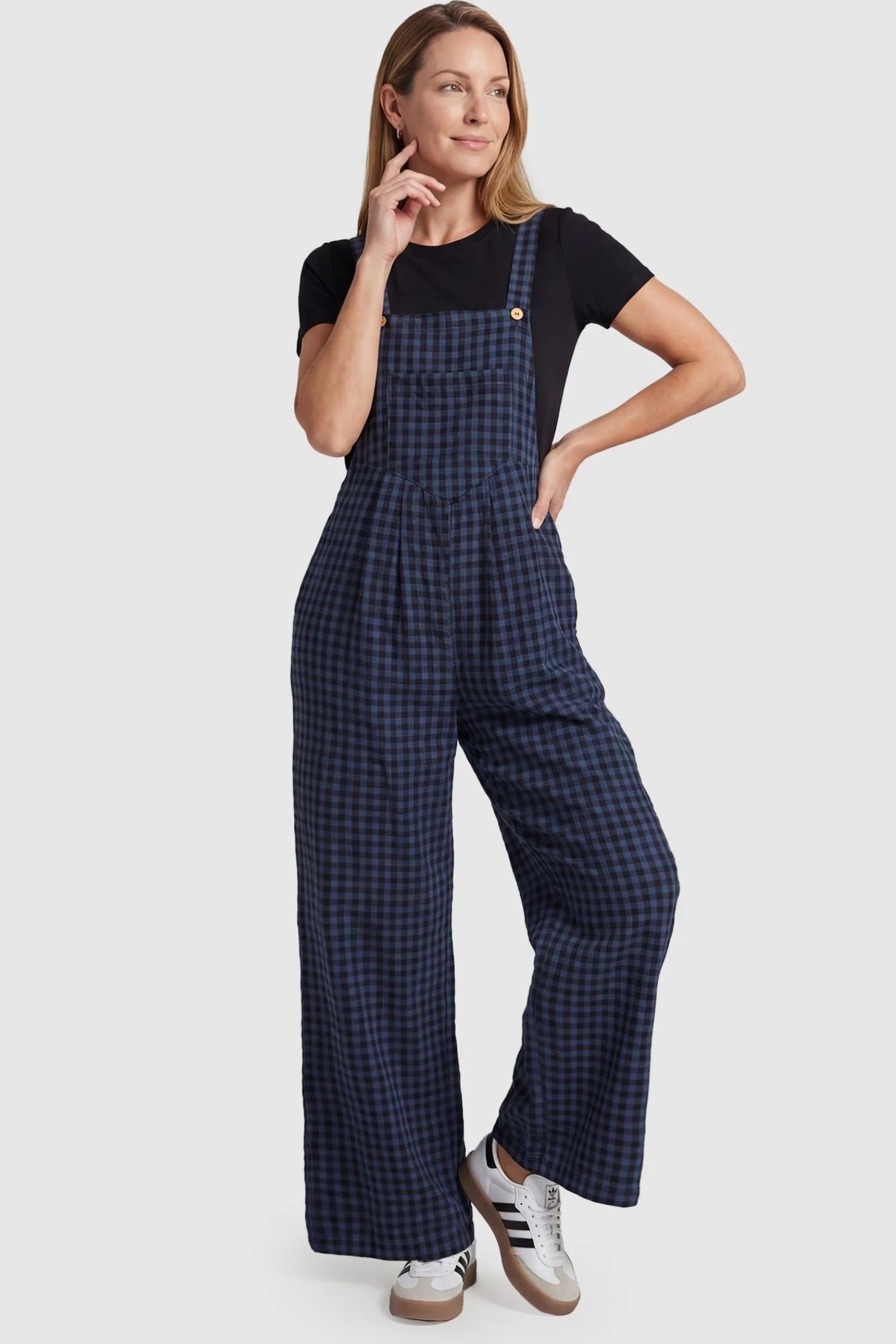 Plaid Square-Neck Button-Detail Maternity Jumpsuit Plaid Square-Neck Button-Detail Maternity Jumpsuit in Blue featuring a relaxed silhouette on a non-pregnant model in a front view.