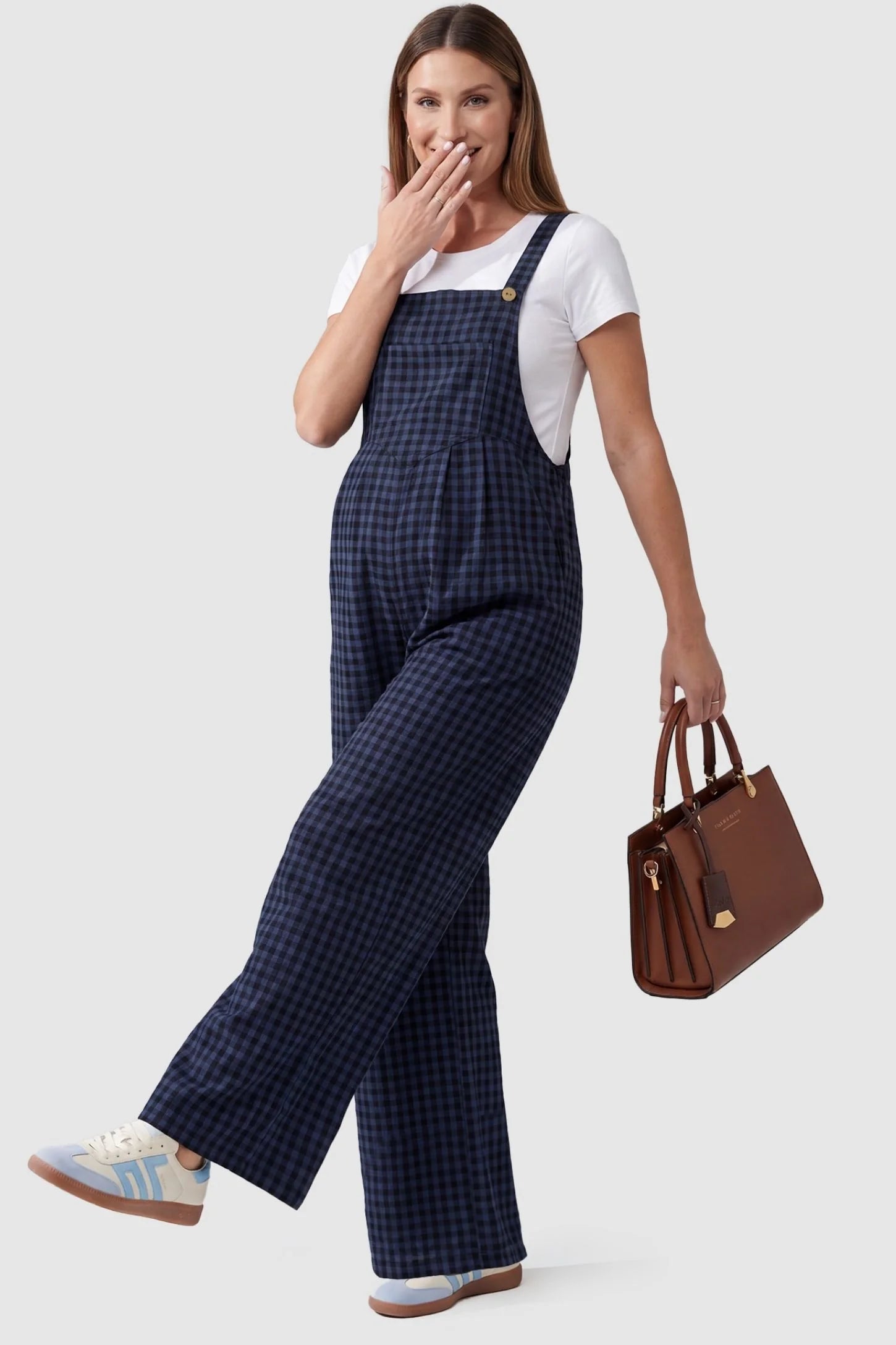 Plaid Square-Neck Button-Detail Maternity Jumpsuit in Blue featuring wood-tone buttons on a pregnant model in a side view.
