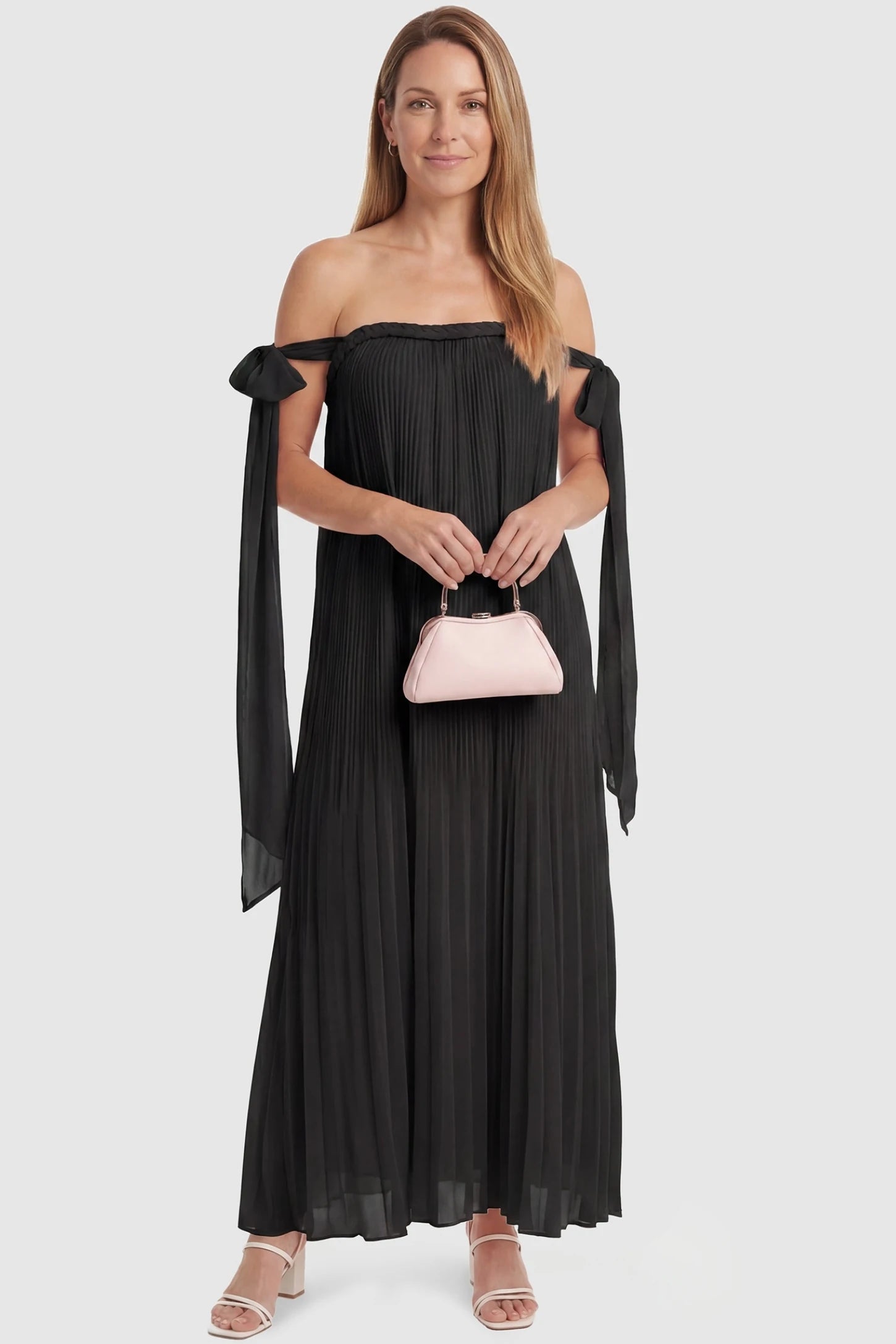 Pleated Braided Cold-Shoulder Maxi Maternity Gown Pleated Braided Cold-Shoulder Maxi Maternity Gown in Black featuring a flowy silhouette on a non-pregnant model, postpartum view.