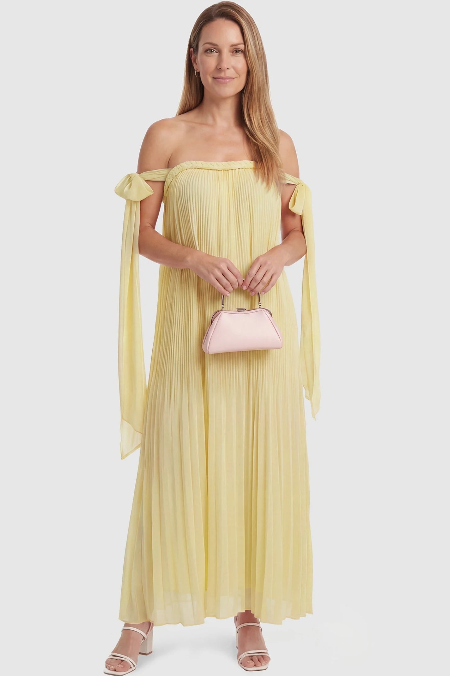 Pleated Braided Cold-Shoulder Maxi Maternity Gown Pleated Braided Cold-Shoulder Maxi Maternity Gown in Yellow featuring a flowy silhouette on a non-pregnant model, postpartum view.