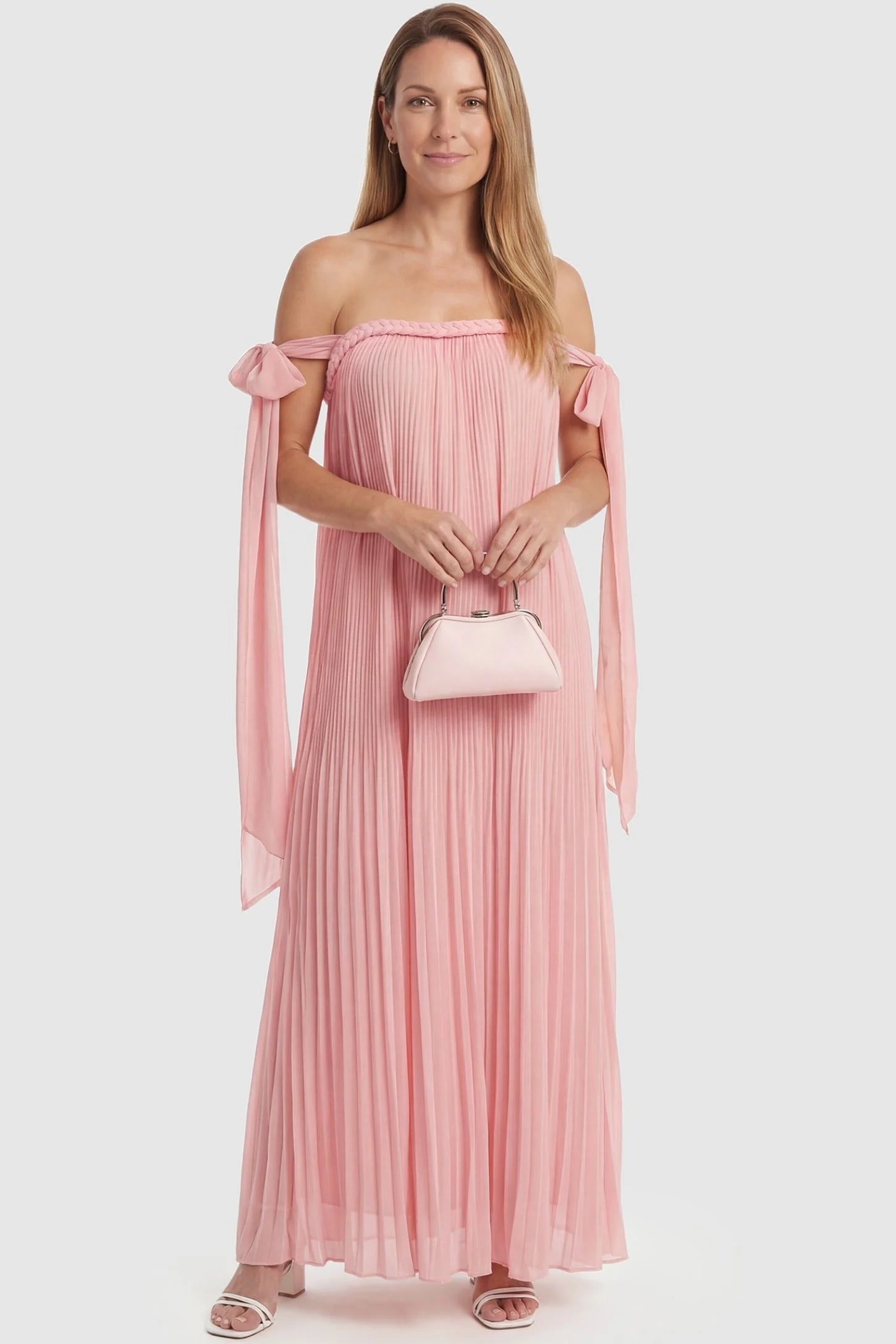 Pleated Braided Cold-Shoulder Maxi Maternity Gown Pleated Braided Cold-Shoulder Maxi Maternity Gown in Pink with pleated design and tie neckline, front view on a non pregnant model.