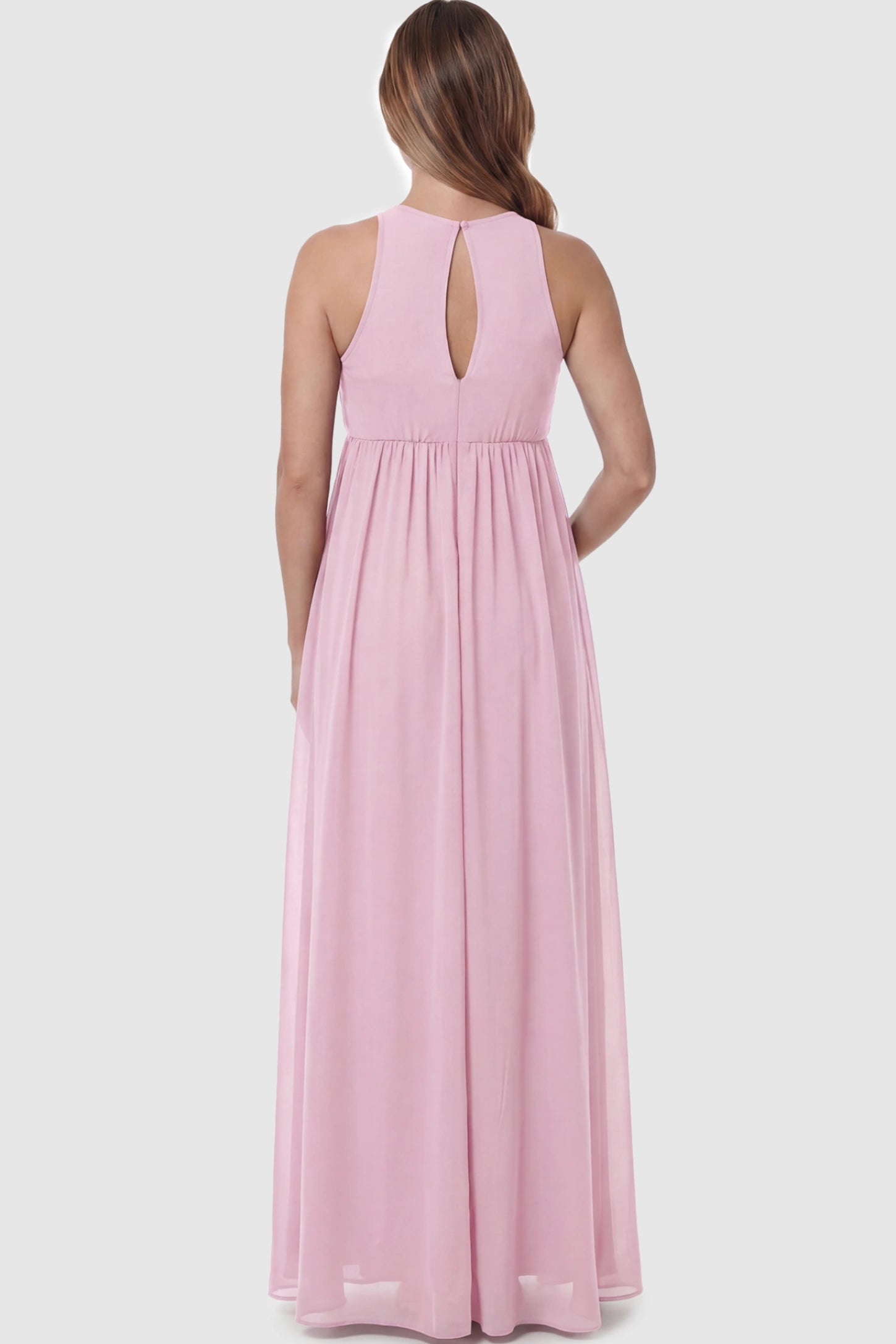 Pleated Mesh Sleeveless Maternity Photoshoot Dress Pleated Mesh Sleeveless Maternity Maxi Dress in pink featuring an empire waist on a pregnant model showing back.