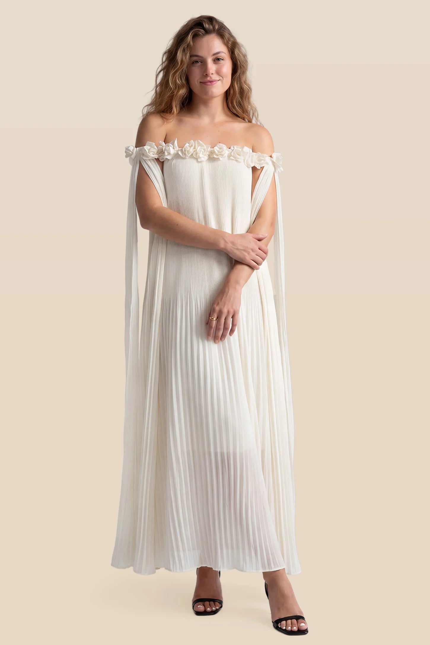 Pleated Off-Shoulder Maternity Gown with Rosettes Pleated Off-Shoulder Maternity Gown with Rosettes in White with romantic rosette details, front view on a non pregnant model.