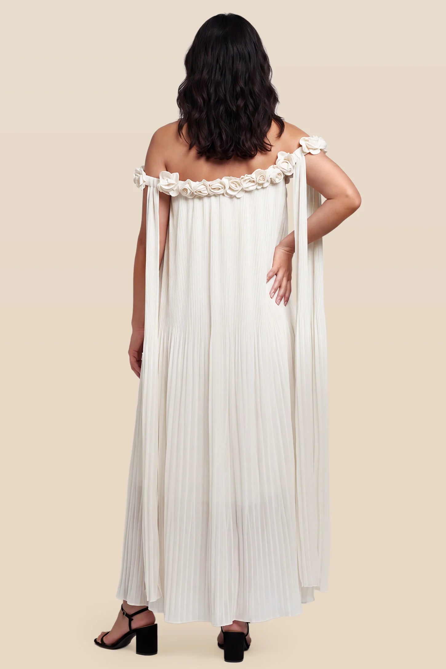Pleated Off-Shoulder Maternity Gown with Rosettes Pleated Off-Shoulder Maternity Gown with Rosettes in White with romantic rosette details, back view on a plus-size model.