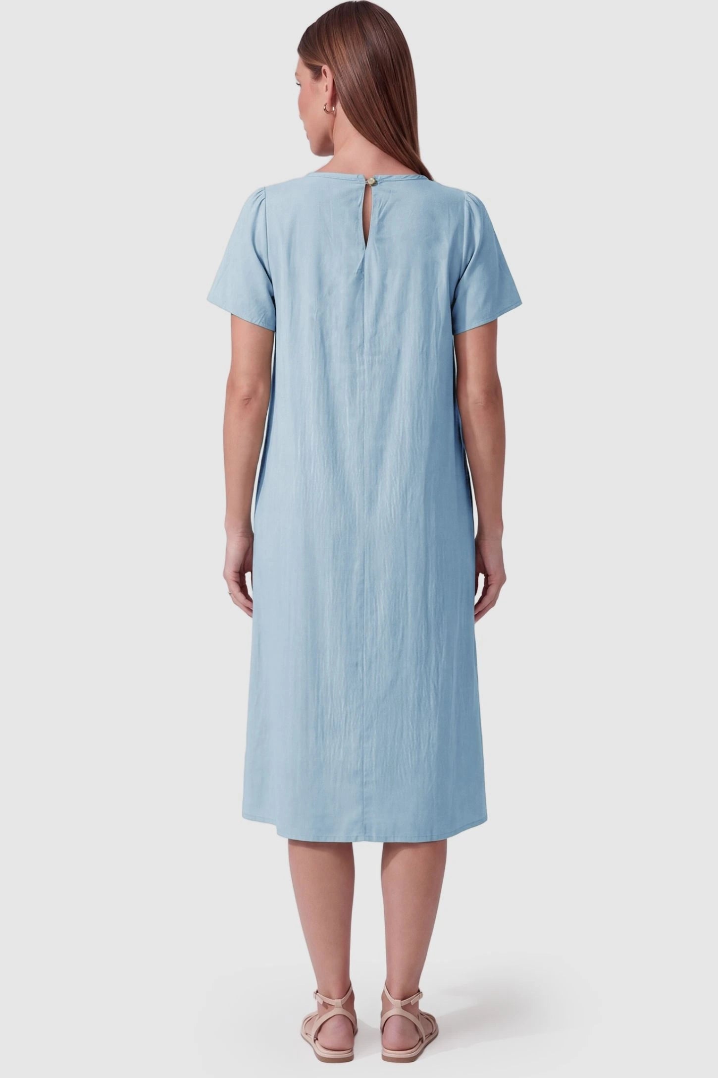 Pleated Round Neck Flowy Midi Maternity Dress Pleated Round Neck Flowy Midi Maternity Dress in Blue featuring a keyhole back closure on a pregnant model, back view.