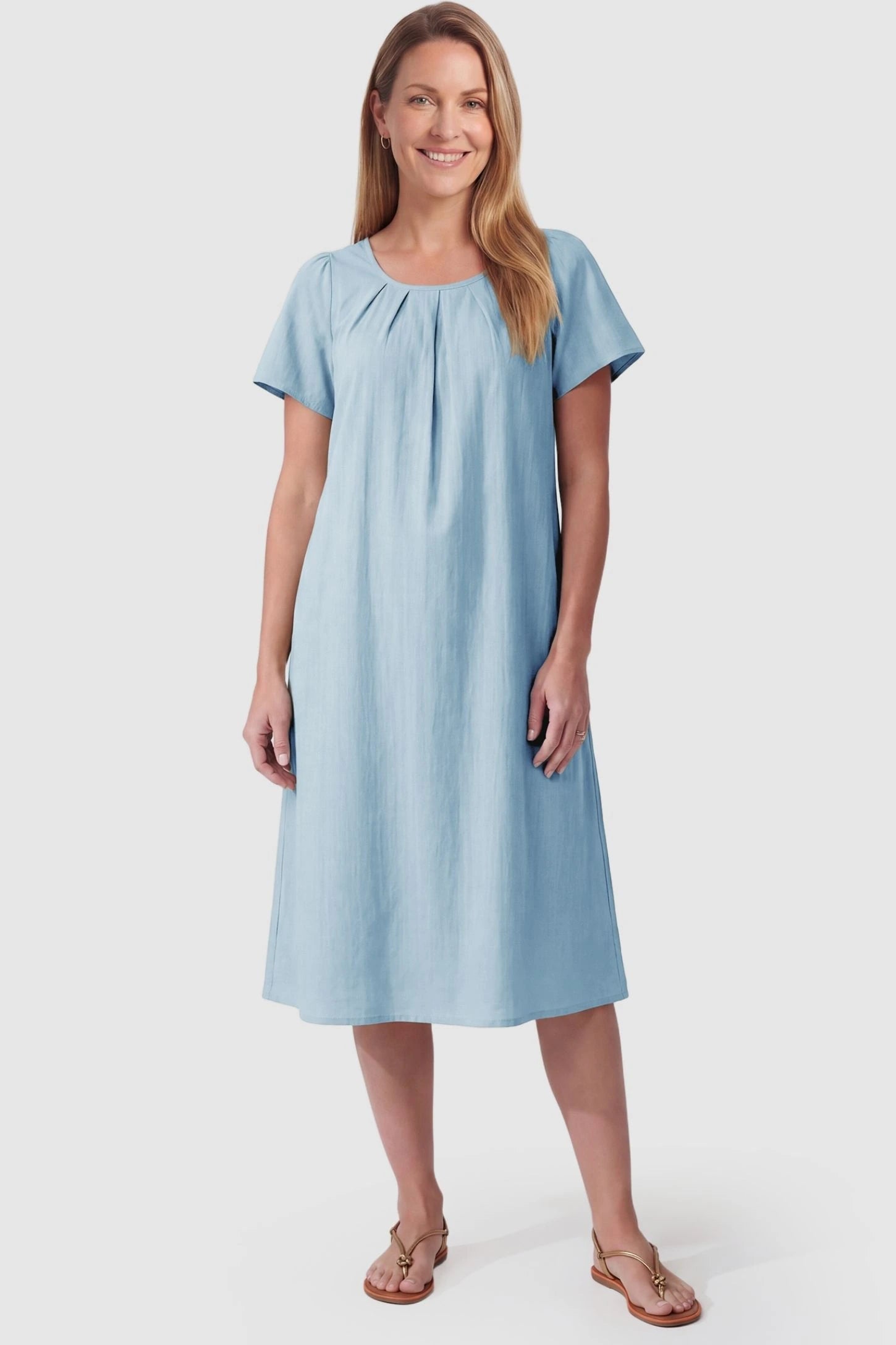 Pleated Round Neck Flowy Midi Maternity Dress Pleated Round Neck Flowy Midi Maternity Dress in Blue featuring a versatile drape on a postpartum model, front view