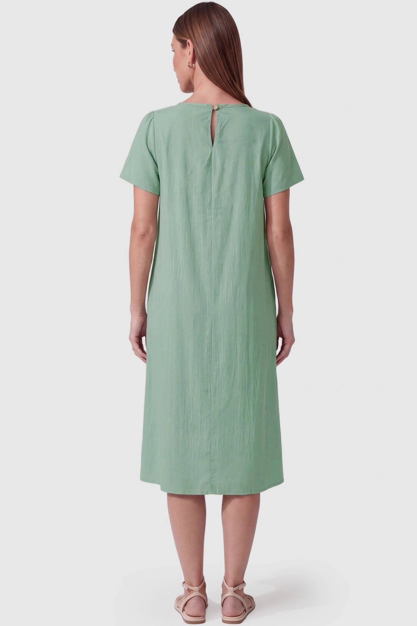 Pleated Round Neck Flowy Midi Maternity Dress Pleated Round Neck Flowy Midi Maternity Dress in Lake Blue featuring a keyhole back closure on a pregnant model, back view.