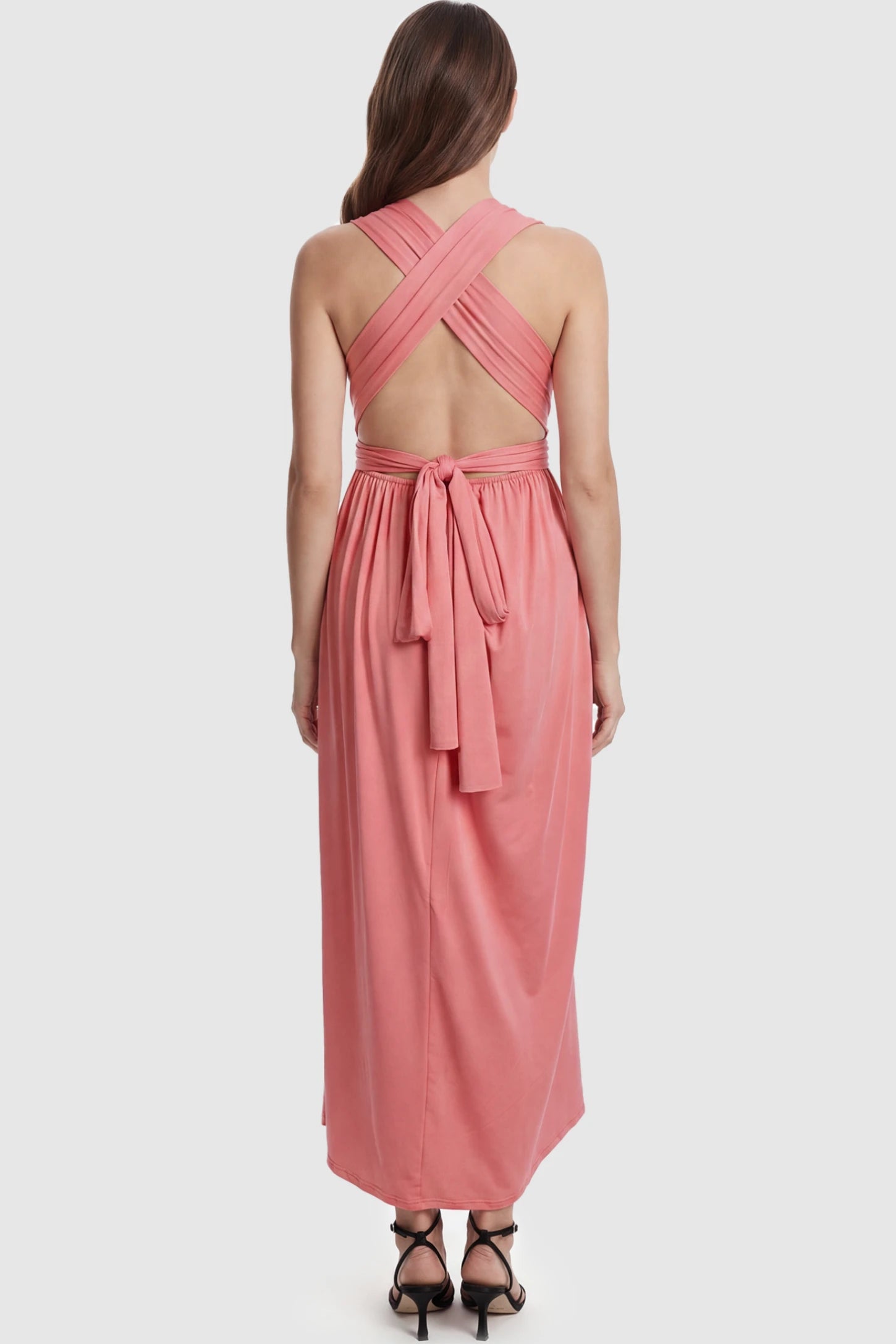 Plunging Halter Empire Waist Maternity Maxi Dress Plunging Halter Empire Waist Maternity Maxi Dress in Pink featuring high-stretch fabric on a pregnant model in a studio setting showing back.