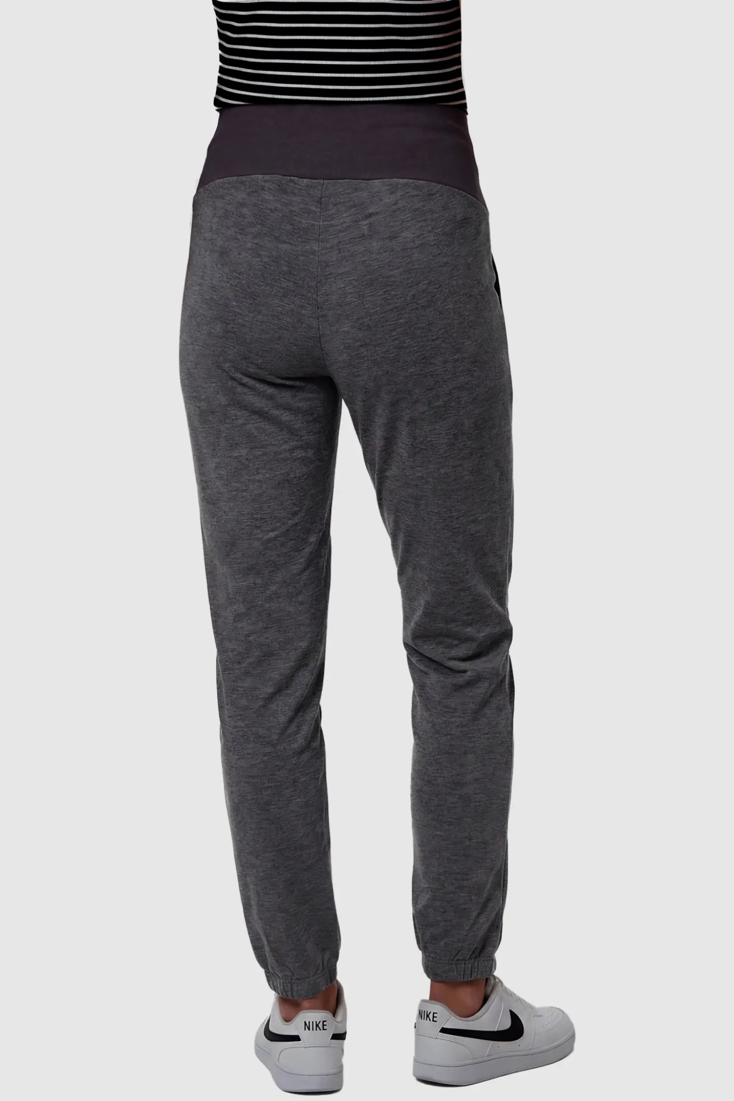 Full Panel Pocketed Maternity Jogger Pants Full Panel Pocketed Maternity Jogger Pants in Dark Gray featuring lightweight, slight stretch fabric on a pregnant model, back view.