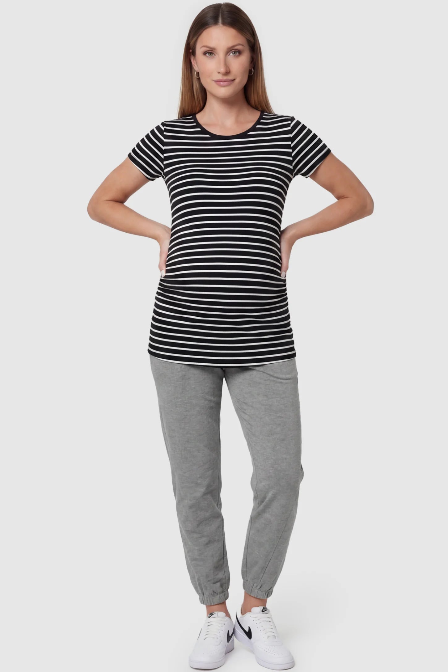 Full Panel Pocketed Maternity Jogger Pants Full Panel Pocketed Maternity Jogger Pants in Light Gray featuring a jersey belly panel on a pregnant model, front view.