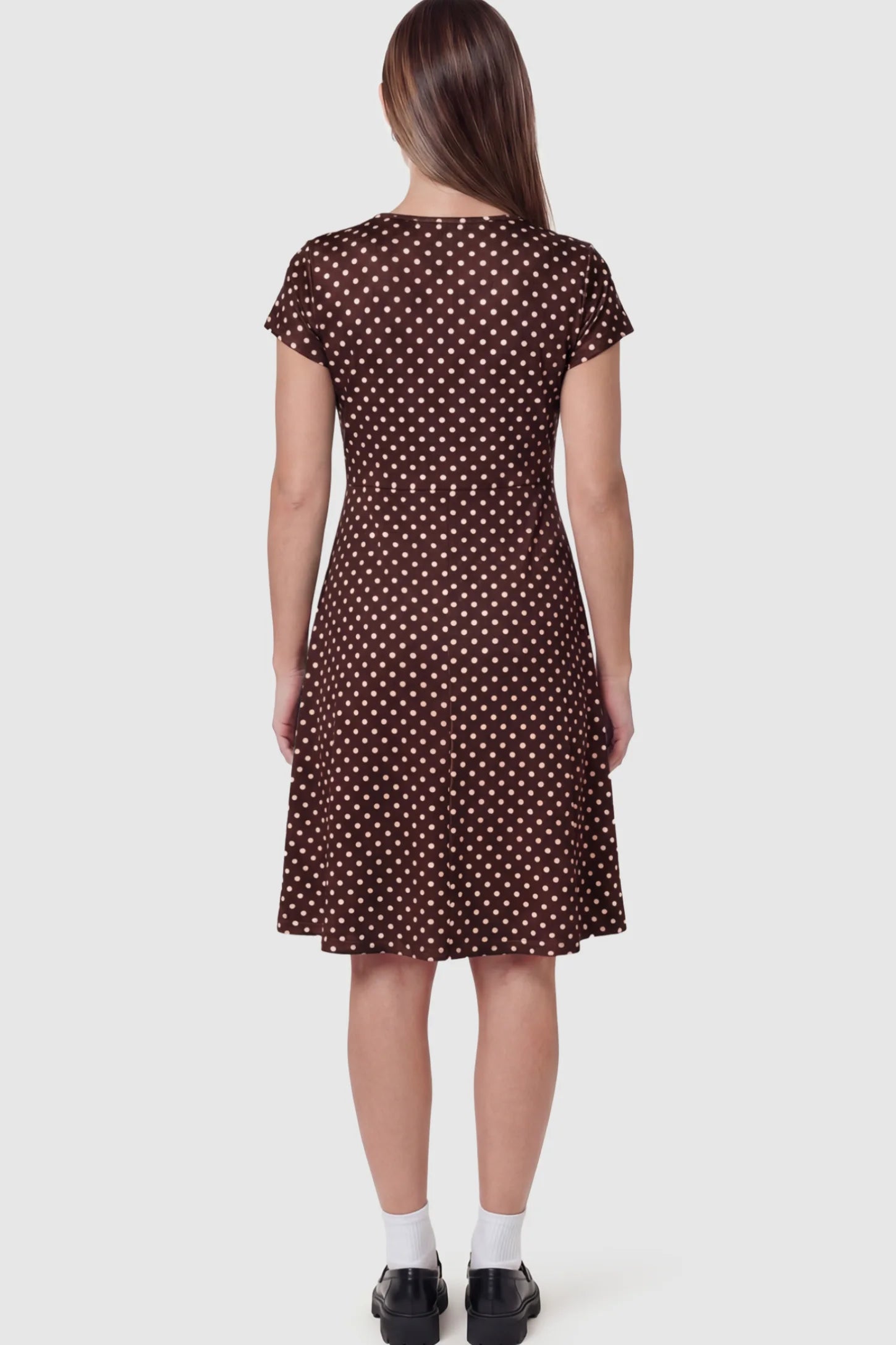 Polka Dot Scoop Neck Maternity Nursing Dress Polka Dot Scoop Neck Midi Maternity Nursing Dress in Brown featuring short sleeves on a pregnant model showing back.