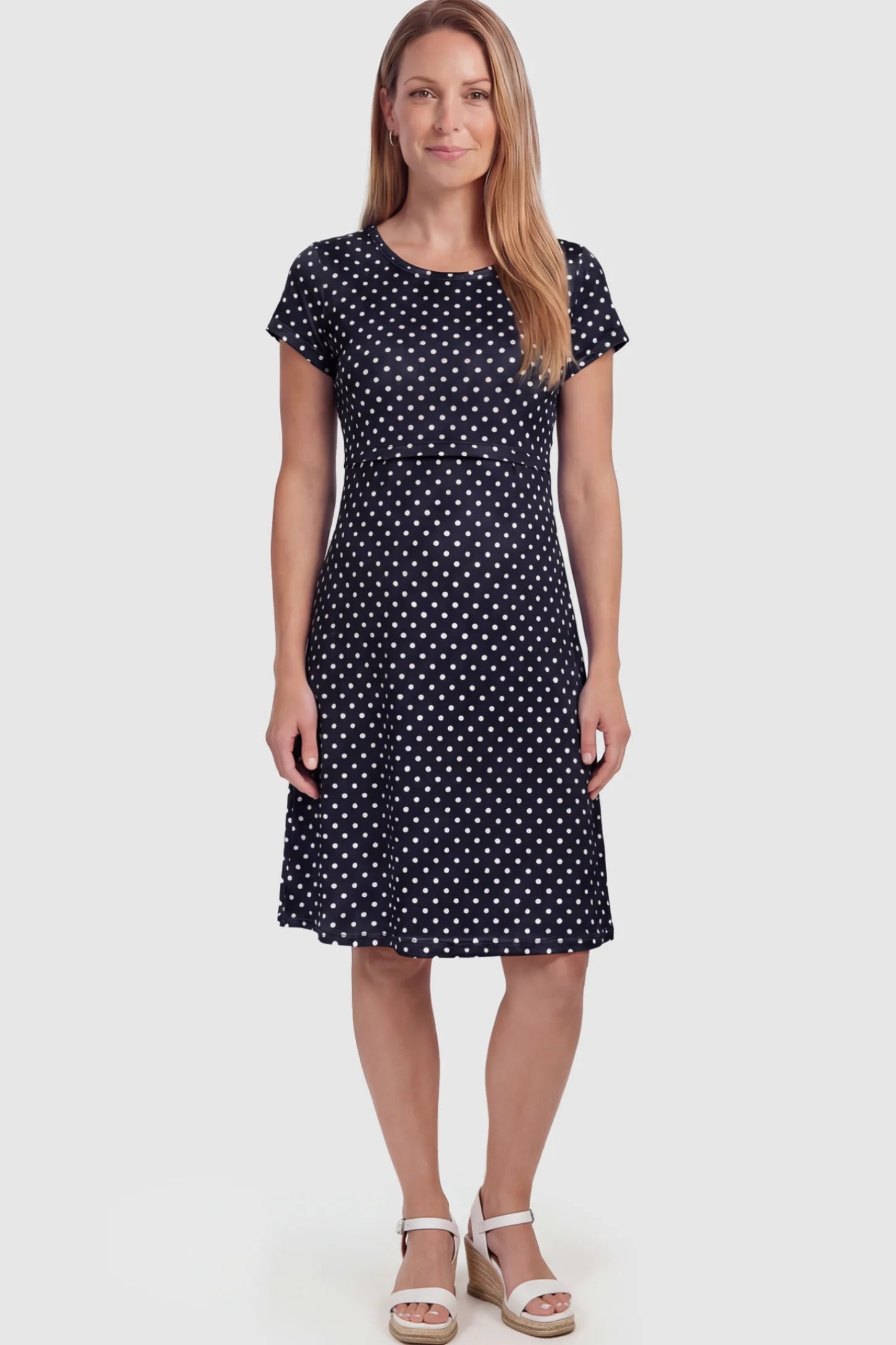 Polka Dot Scoop Neck Maternity Nursing Dress Polka Dot Scoop Neck Midi Maternity Nursing Dress in Navy blue featuring a discreet lift-up layer on a postpartum model showing front.
