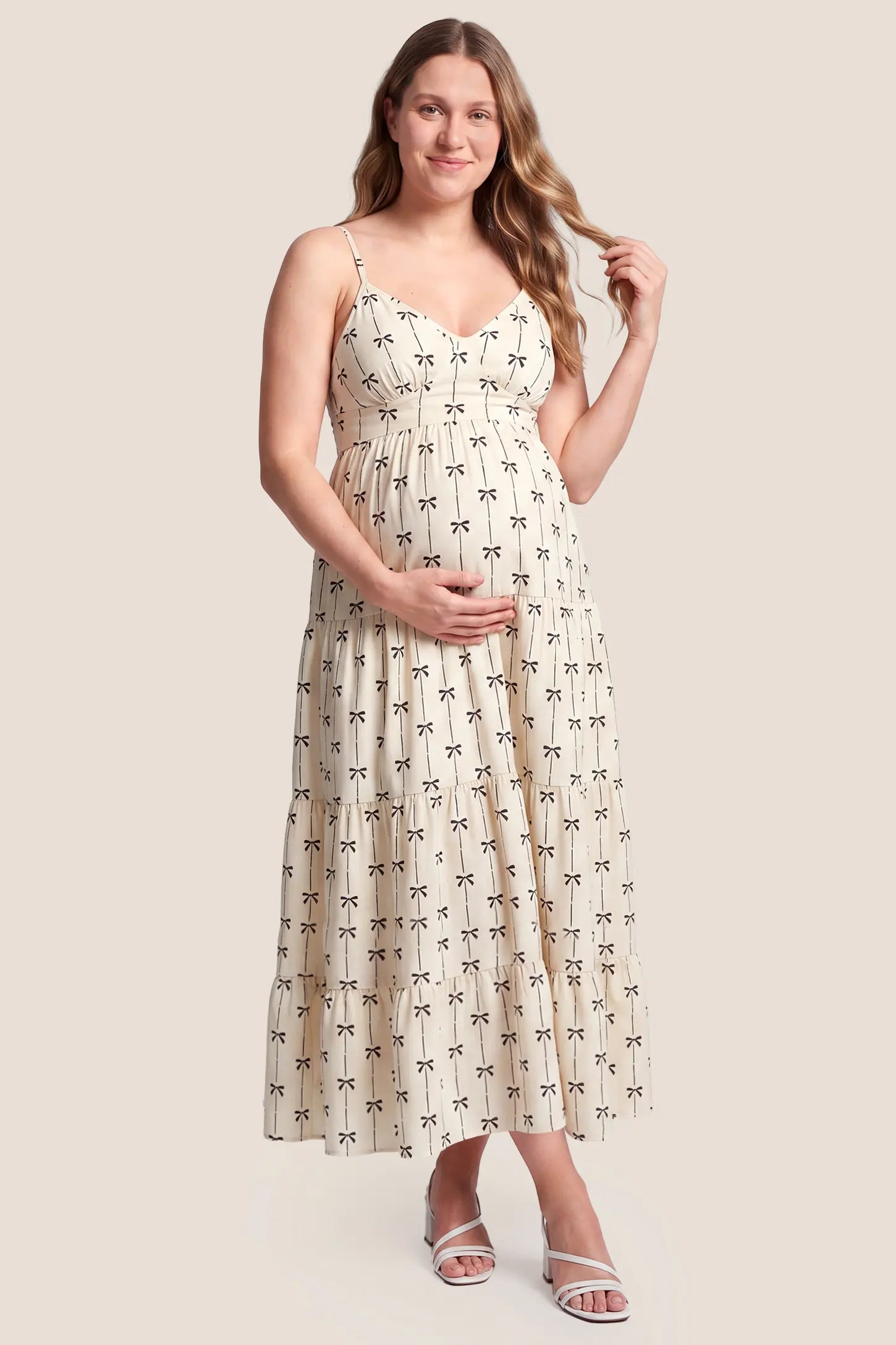 Print Tiered Cami Maternity Maxi Dress Print Tiered Cami Maternity Maxi Dress in Khaki with printed tiered design, front view on a plus-size model.
