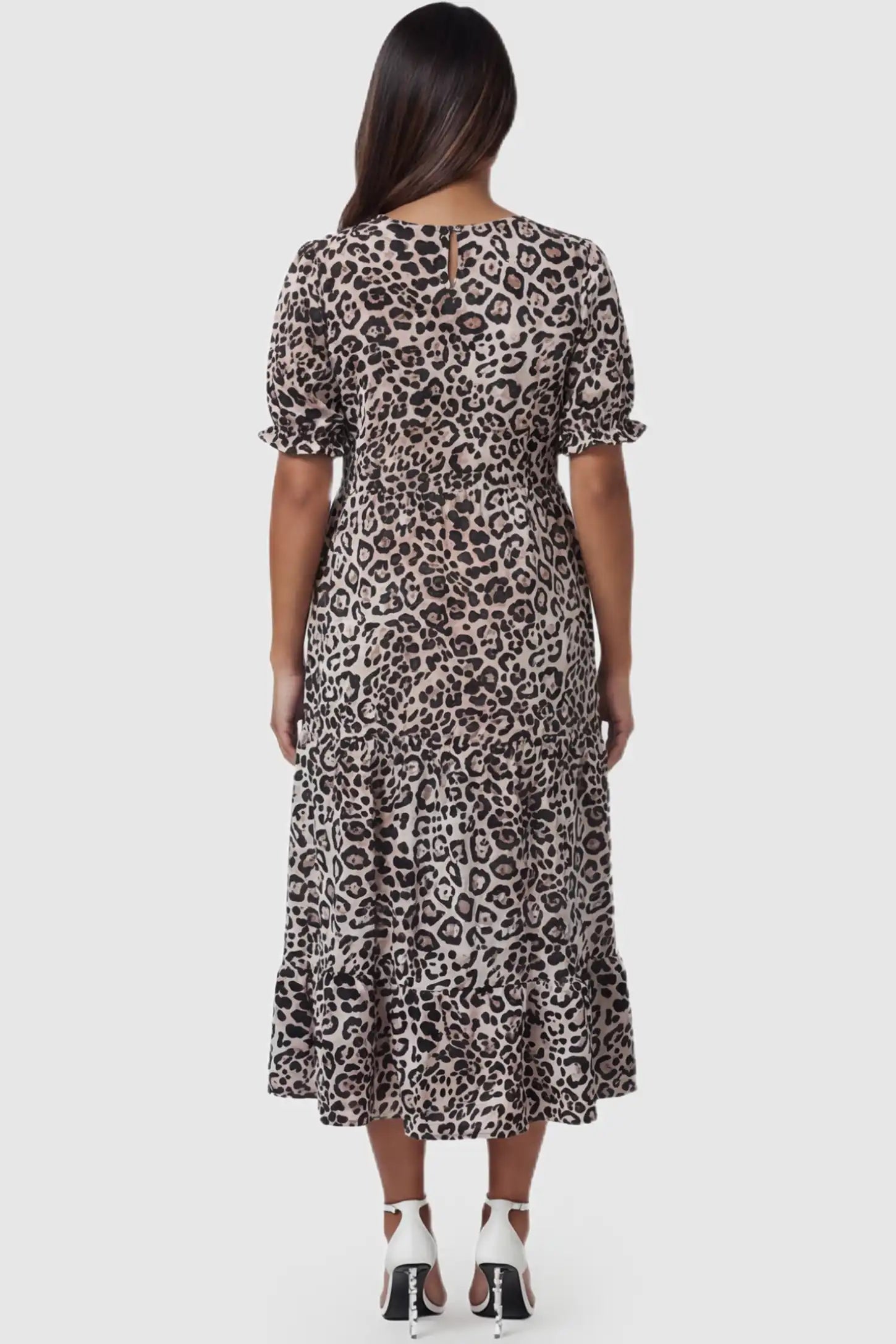 Printed Short Sleeve Tiered Maternity Midi Dress Printed Short Sleeve Tiered Maternity Midi Dress in leopard print featuring round neck, tiered A-line skirt on a pregnant model, back view.