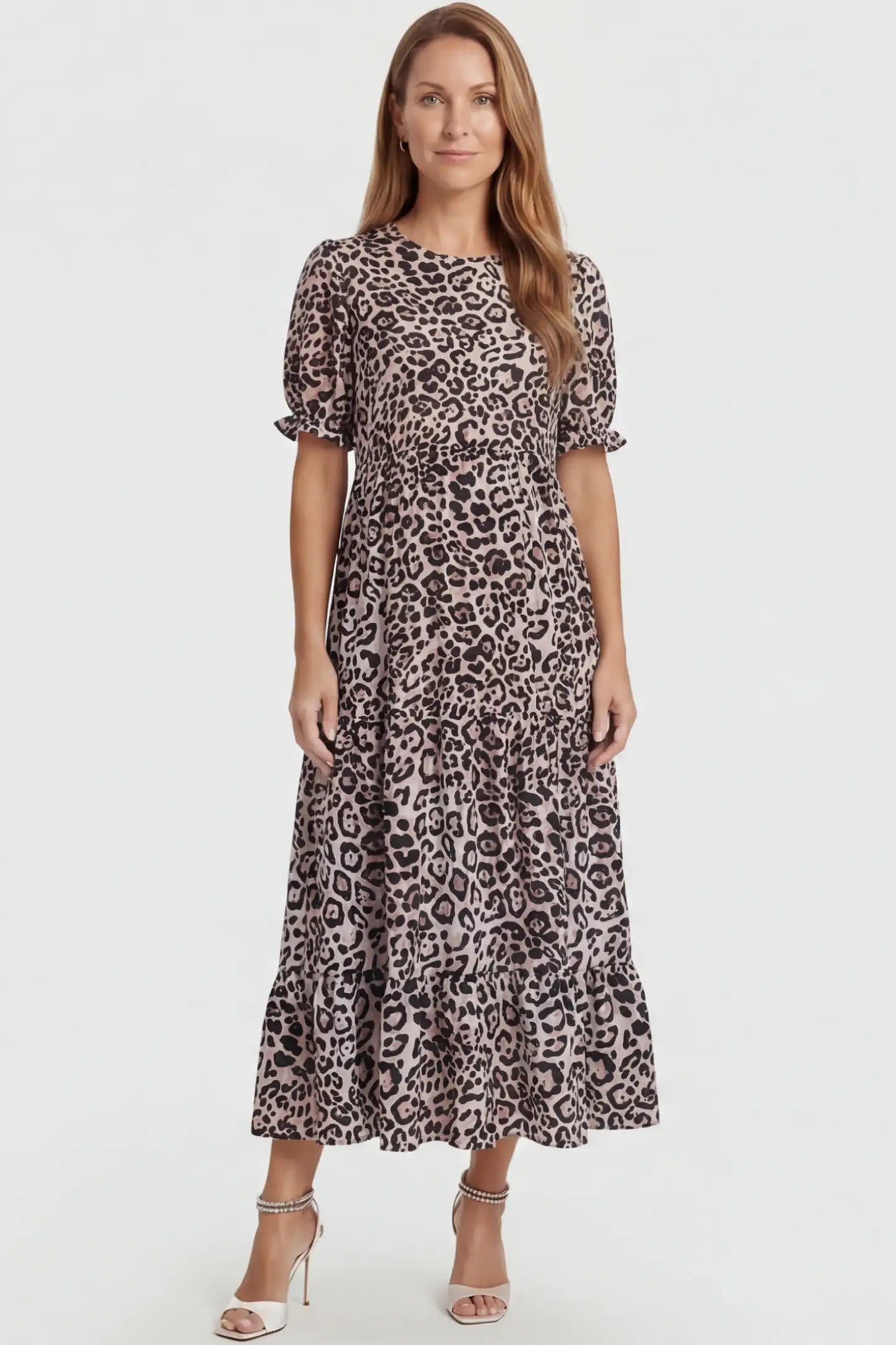 Printed Short Sleeve Tiered Maternity Midi Dress Printed Short Sleeve Tiered Maternity Midi Dress in leopard print featuring round neck, tiered A-line skirt on a postpartum model, front view.