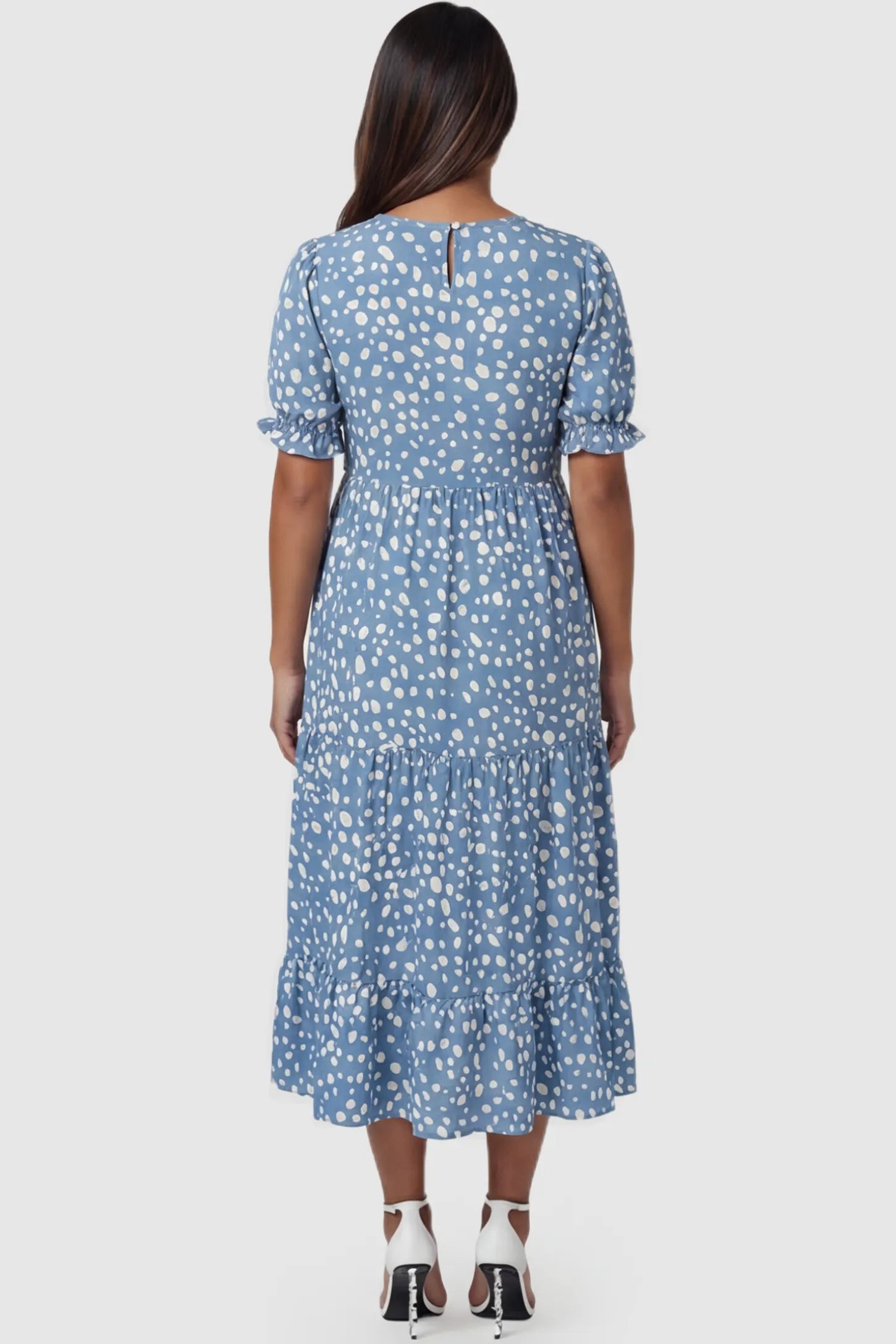Printed Short Sleeve Tiered Maternity Midi Dress Printed Short Sleeve Tiered Maternity Midi Dress in light blue featuring round neck, tiered A-line skirt on a pregnant model, back view.