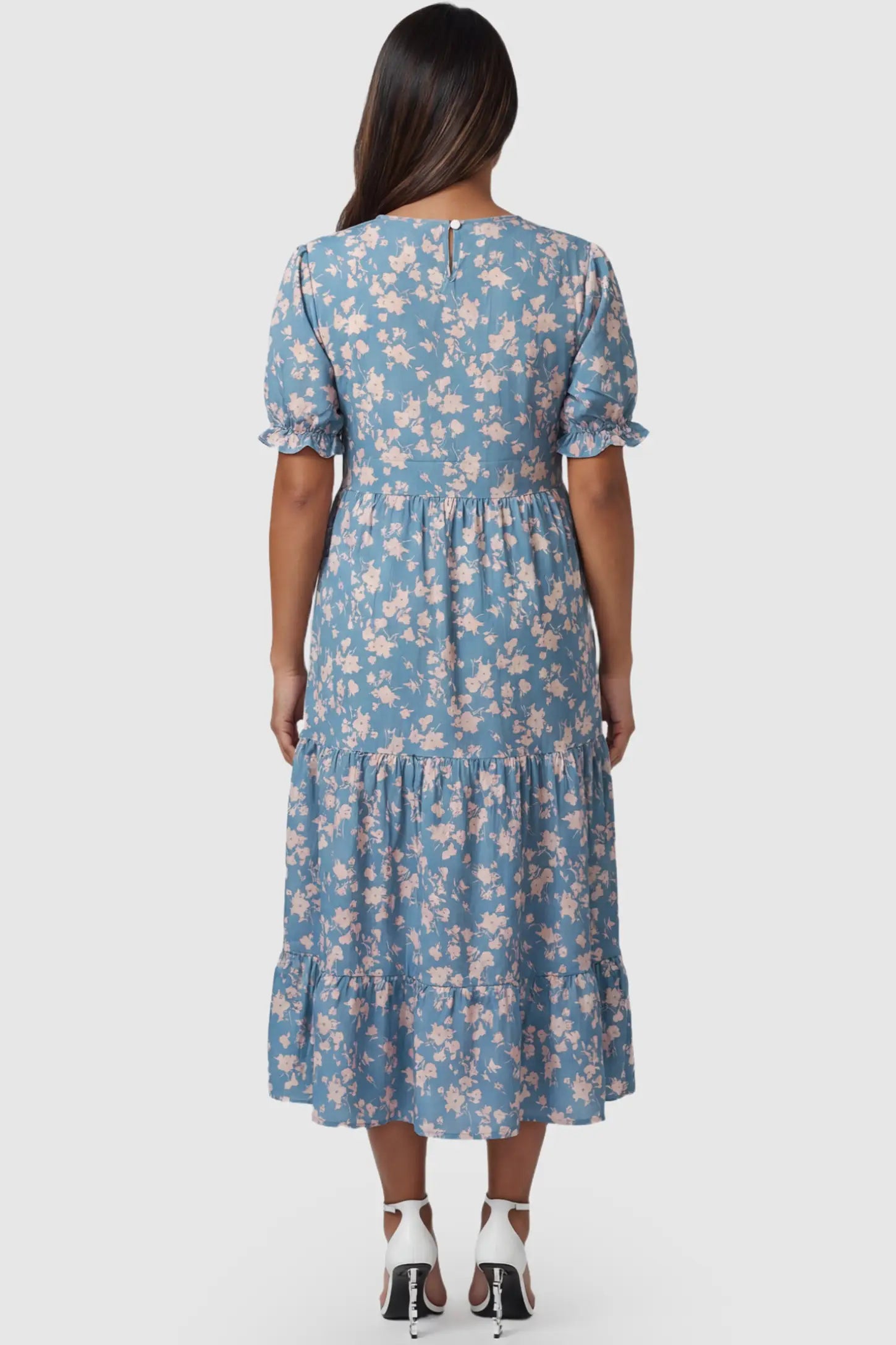Printed Short Sleeve Tiered Maternity Midi Dress Printed Short Sleeve Tiered Maternity Midi Dress in ocean blue featuring round neck, tiered A-line skirt on a pregnant model, back view.