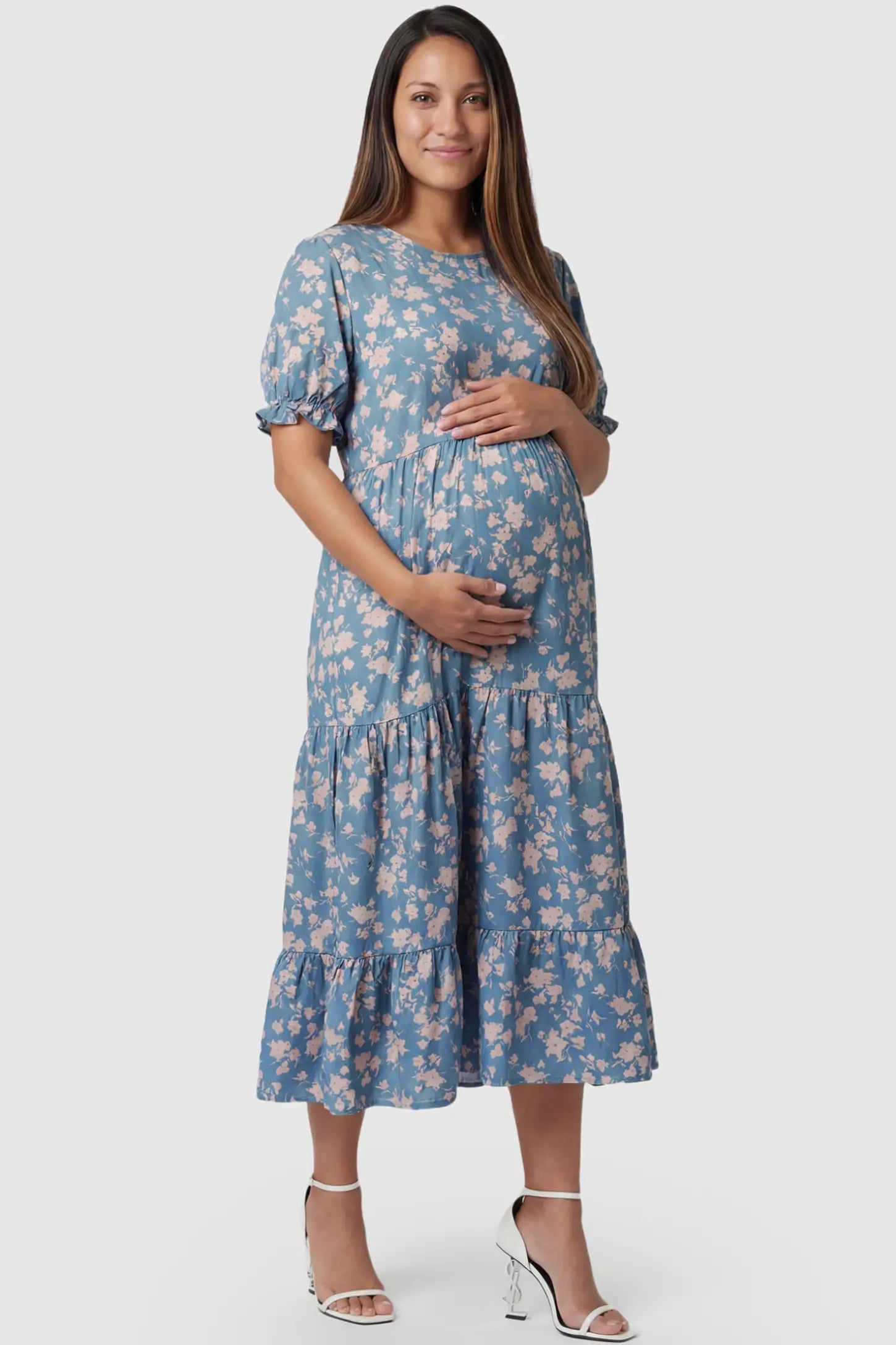 Printed Short Sleeve Tiered Maternity Midi Dress Printed Short Sleeve Tiered Maternity Midi Dress in ocean blue featuring round neck, tiered A-line skirt on a pregnant model, front view.