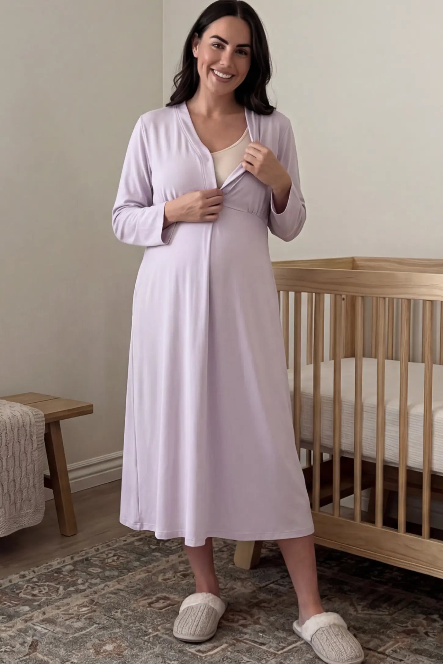 Pure Cotton V-Neck Button Front Maternity Nursing Sleepwear Pure Cotton V-Neck Button Front Maternity Nursing Dress in Light Purple featuring button front nursing on a pregnant woman showing nursing access in a room setting.