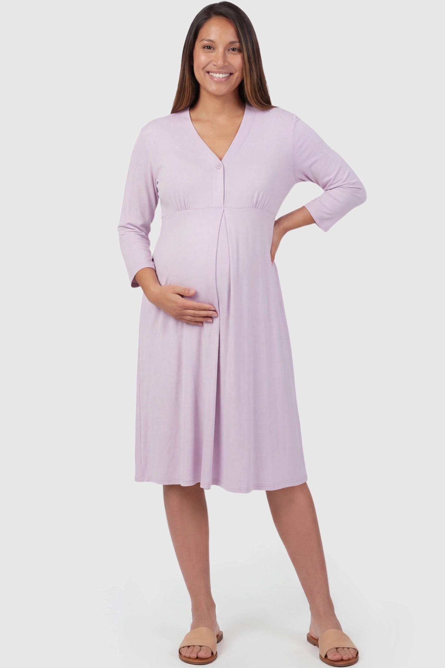 Pure Cotton V-Neck Button Front Maternity Nursing Dress in Light Purple featuring button front nursing on a pregnant model posing front.