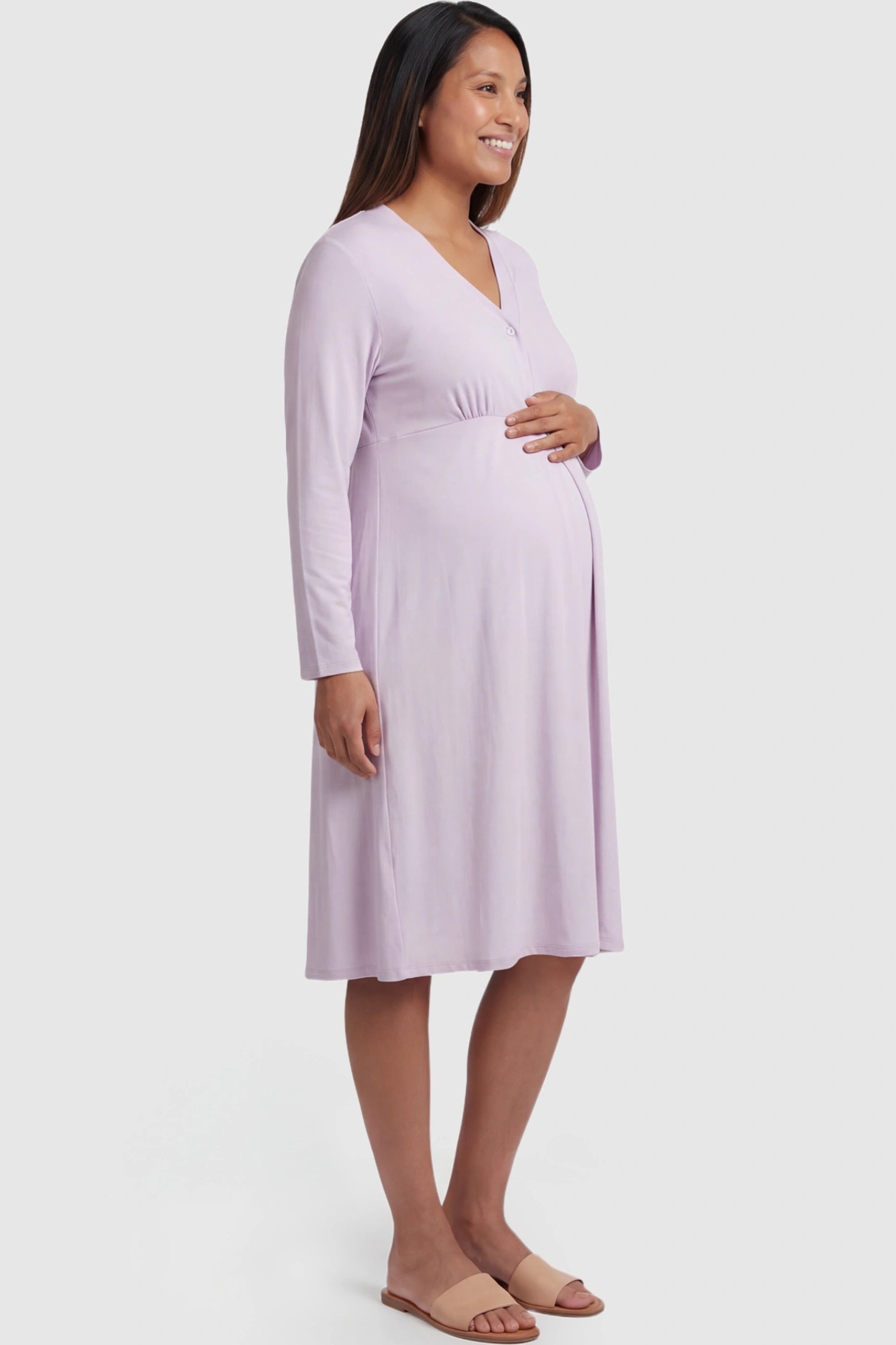 Pure Cotton V-Neck Button Front Maternity Nursing Dress in Light Purple featuring button front nursing on a pregnant model showing side.