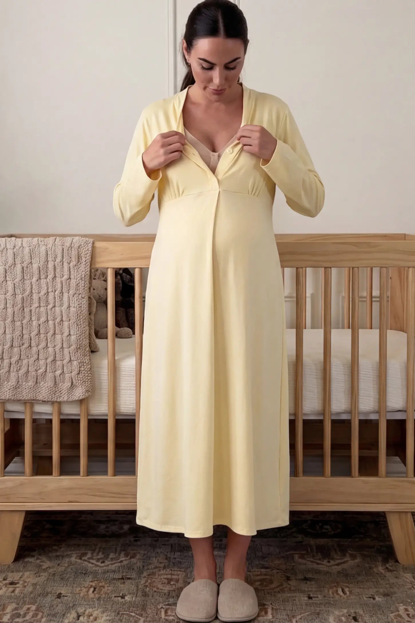 Pure Cotton V-Neck Button Front Maternity Nursing Sleepwear Pure Cotton V-Neck Button Front Maternity Nursing Dress in Yellow featuring button front nursing on a pregnant woman showing nursing access in a room setting.