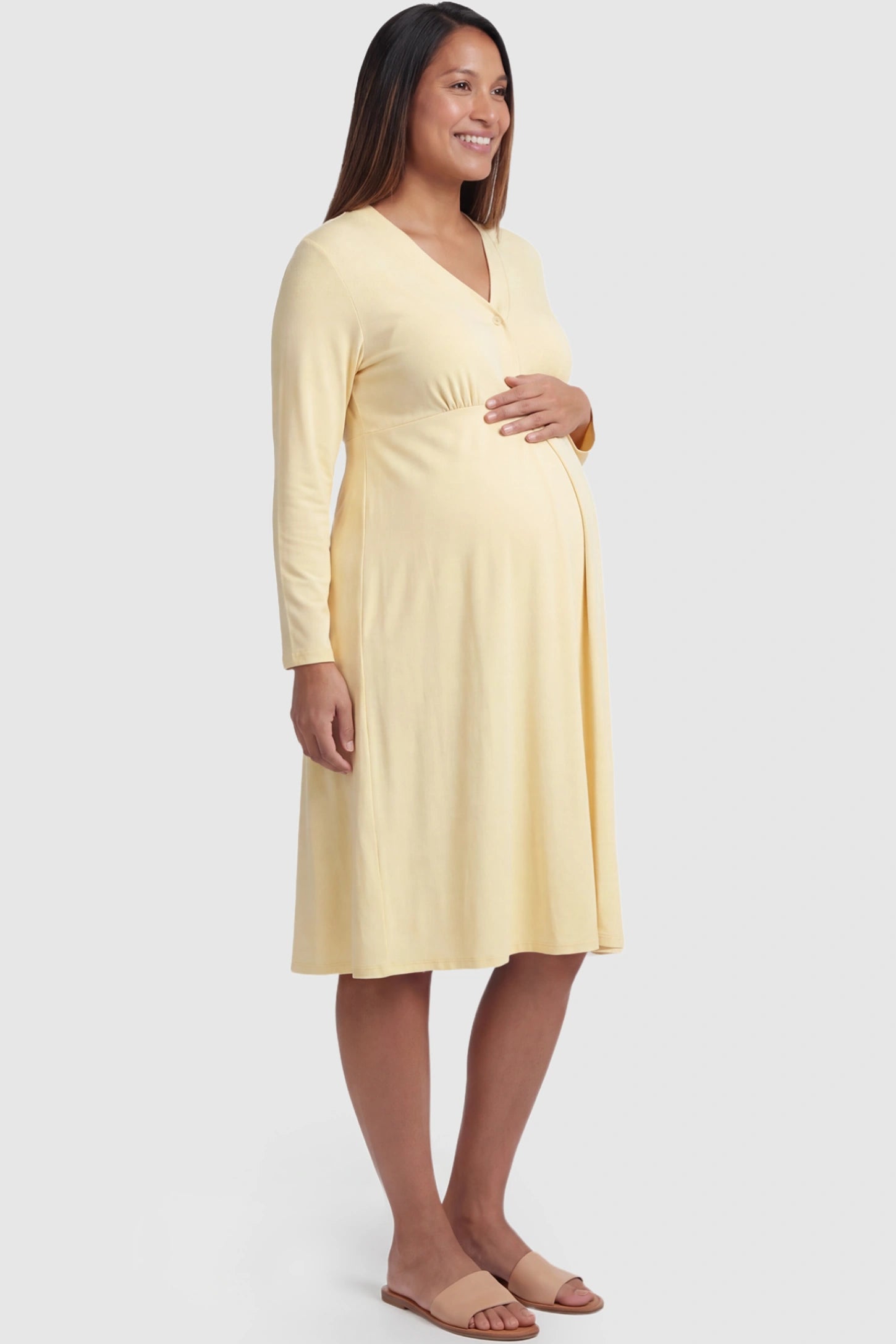 Pure Cotton V-Neck Button Front Maternity Nursing Sleepwear Pure Cotton V-Neck Button Front Maternity Nursing Dress in Yellow featuring button front nursing on a pregnant model showing side.
