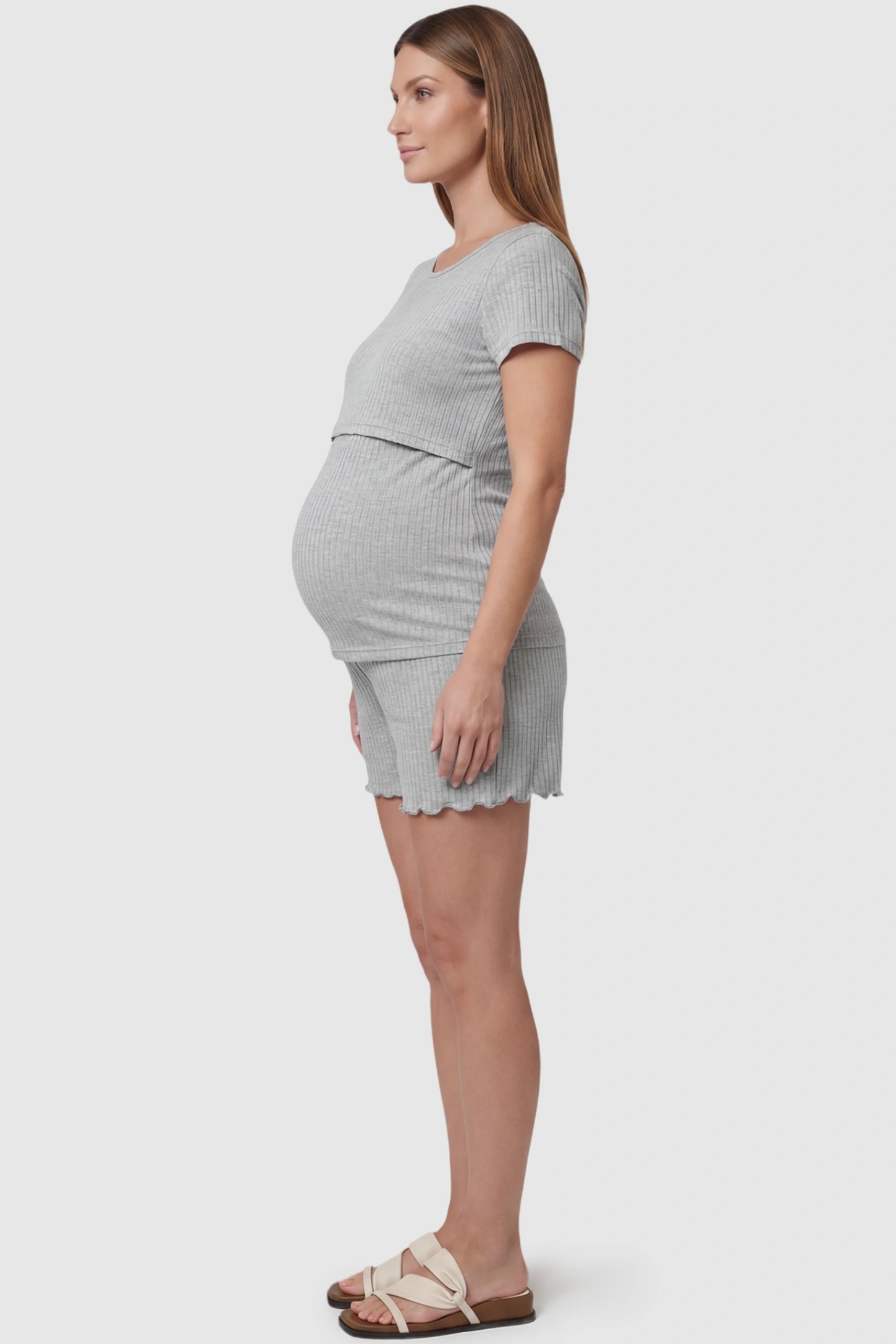 Ribbed Short Sleeve Top & Drawstring Shorts Maternity Nursing Lounge Set Ribbed Short Sleeve Top & Drawstring Shorts Maternity Nursing Lounge Set in gray featuring lift-up nursing layers on a pregnant model, side view.