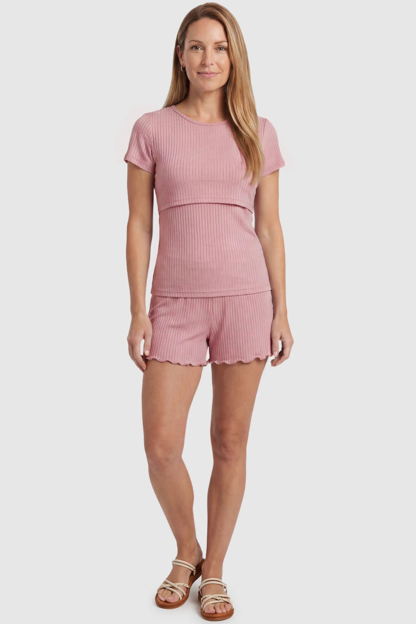 Ribbed Short Sleeve Top & Drawstring Shorts Maternity Nursing Lounge Set Ribbed Short Sleeve Top & Drawstring Shorts Maternity Nursing Lounge Set in pink featuring lift-up nursing layers on a postpartum model, front view.