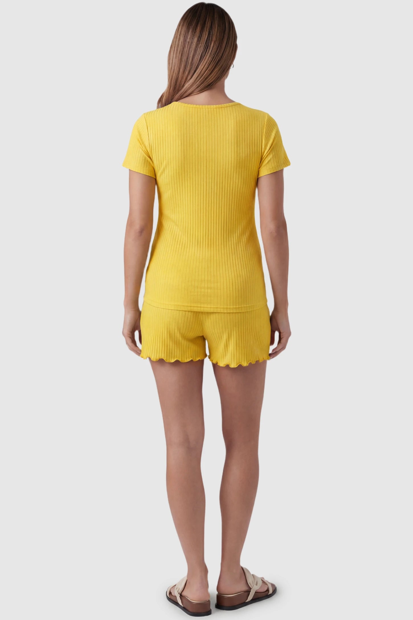 Ribbed Short Sleeve Top & Drawstring Shorts Maternity Nursing Lounge Set Ribbed Short Sleeve Top & Drawstring Shorts Maternity Nursing Lounge Set in Yellow featuring seamless back design on a pregnant model, back view.