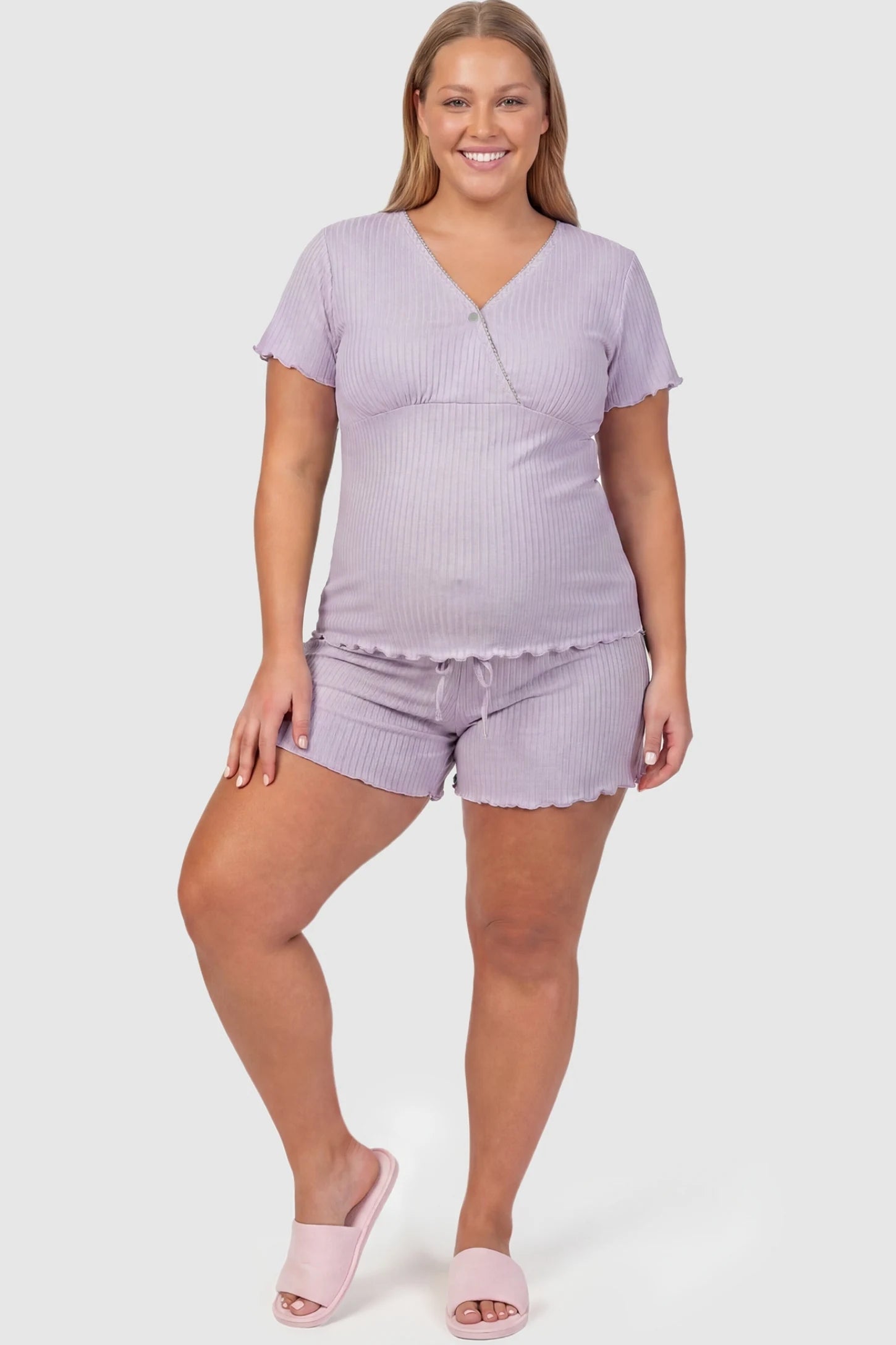 Ribbed Short Sleeve & Drawstring Shorts Maternity Pajama Set Ribbed Short Sleeve & Drawstring Shorts Maternity Pajama Set in Purple featuring a soft ribbed cross-over top on a pregnant model, plus size front view.