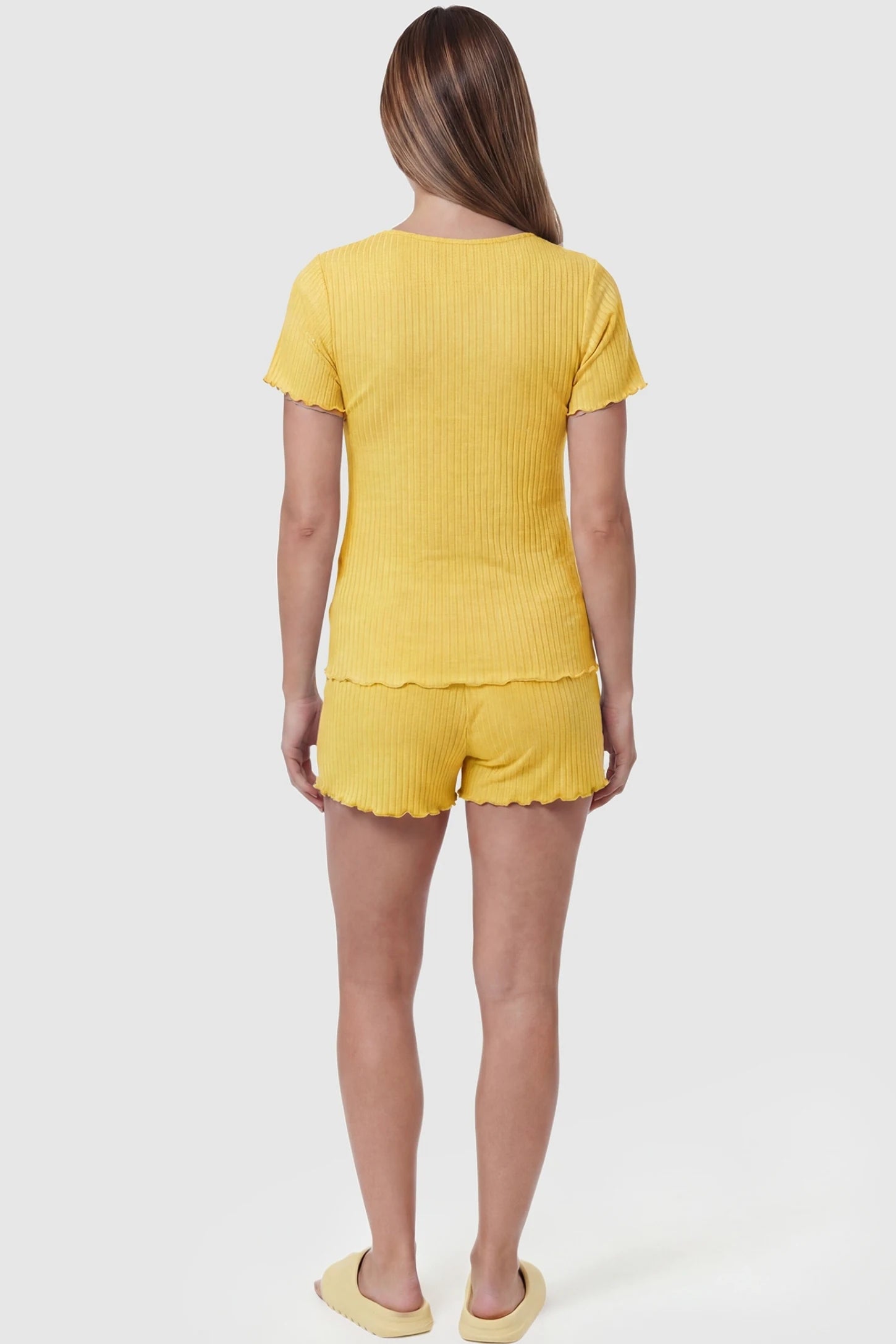 Ribbed Short Sleeve & Drawstring Shorts Maternity Pajama Set Ribbed Short Sleeve & Drawstring Shorts Maternity Pajama Set in Yellow featuring a lettuce-edge ribbed knit on a pregnant model, back view.