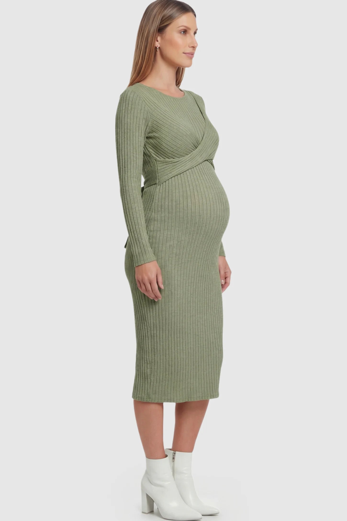 Ribbed Knit Cross Front Fitted Maternity Midi Dress Ribbed Knit Cross Front Fitted Maternity Midi Dress in Green featuring a supportive criss-cross bodice on a pregnant model.