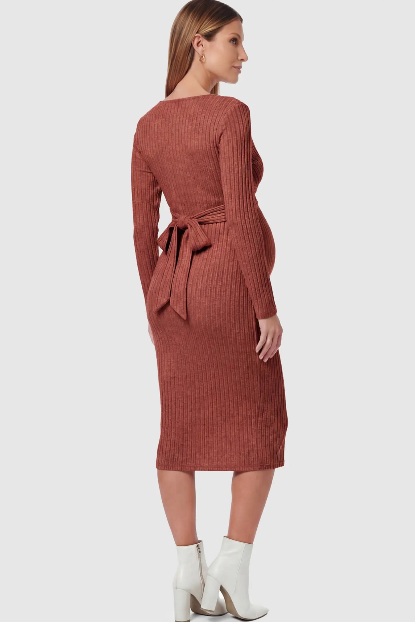 Ribbed Knit Cross Front Fitted Maternity Midi Dress Ribbed Knit Cross Front Fitted Maternity Midi Dress in Wine Red featuring a back waist-tie on a pregnant model.
