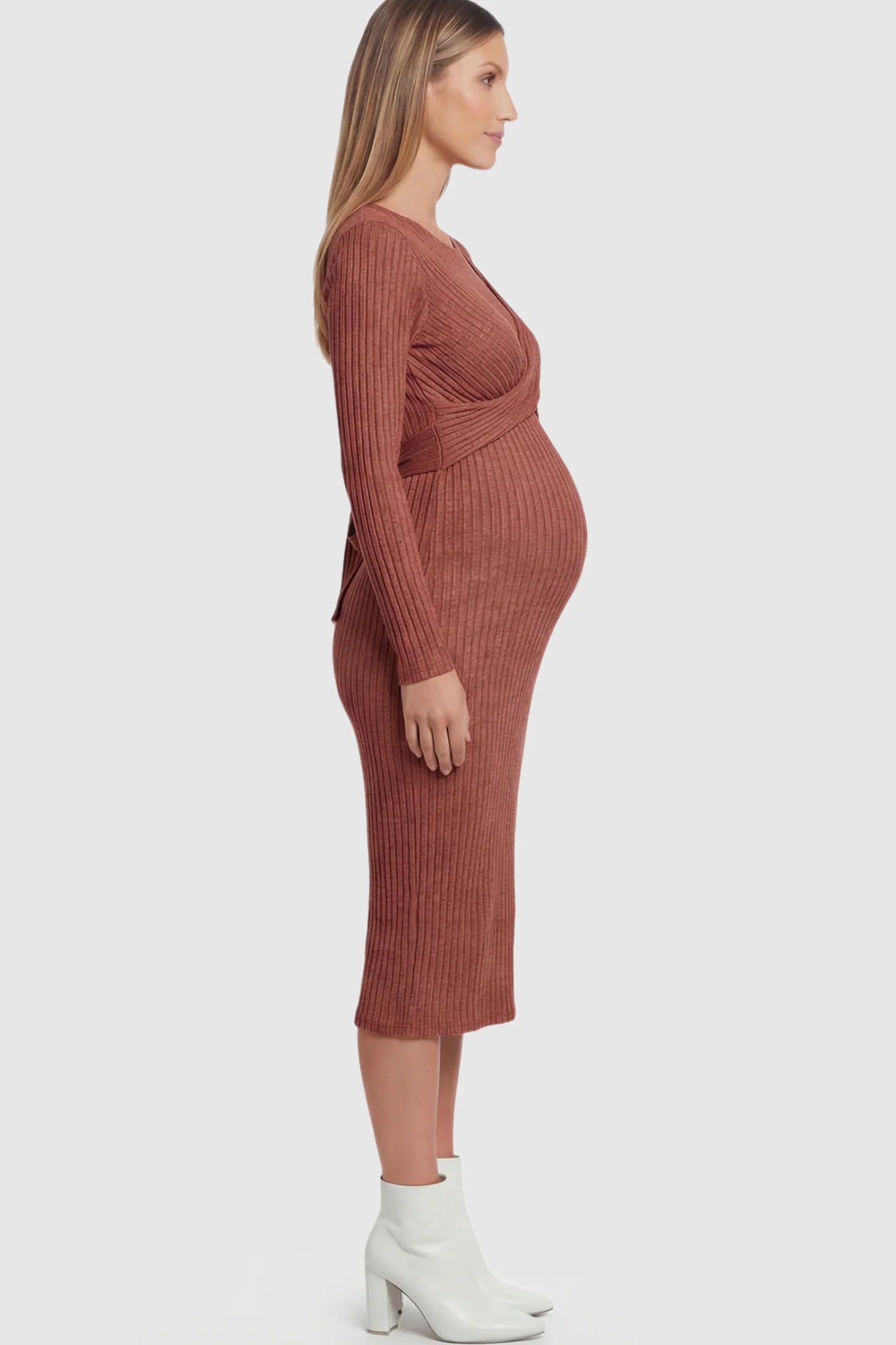Ribbed Knit Cross Front Fitted Maternity Midi Dress Ribbed Knit Cross Front Fitted Maternity Midi Dress in Wine Red featuring a supportive criss-cross bodice on a pregnant model.