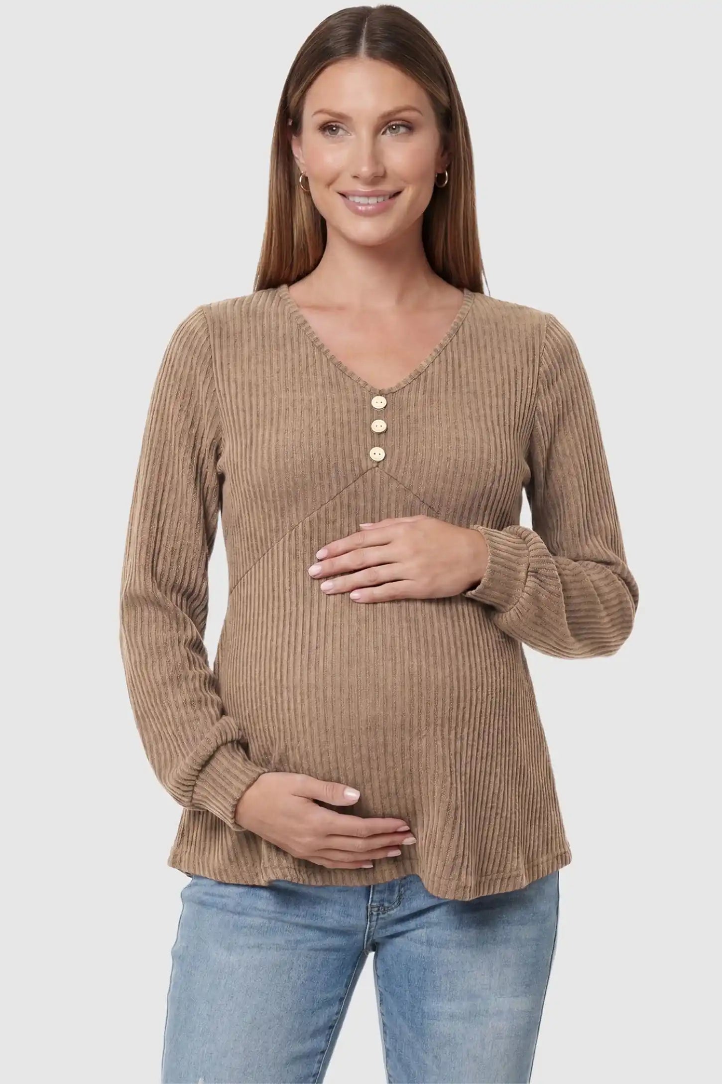 Ribbed Knit Empire Waist Maternity Top Ribbed Knit Empire Waist Maternity Top in khaki featuring a v-neckline and ribbed knit texture on a pregnant model front view.