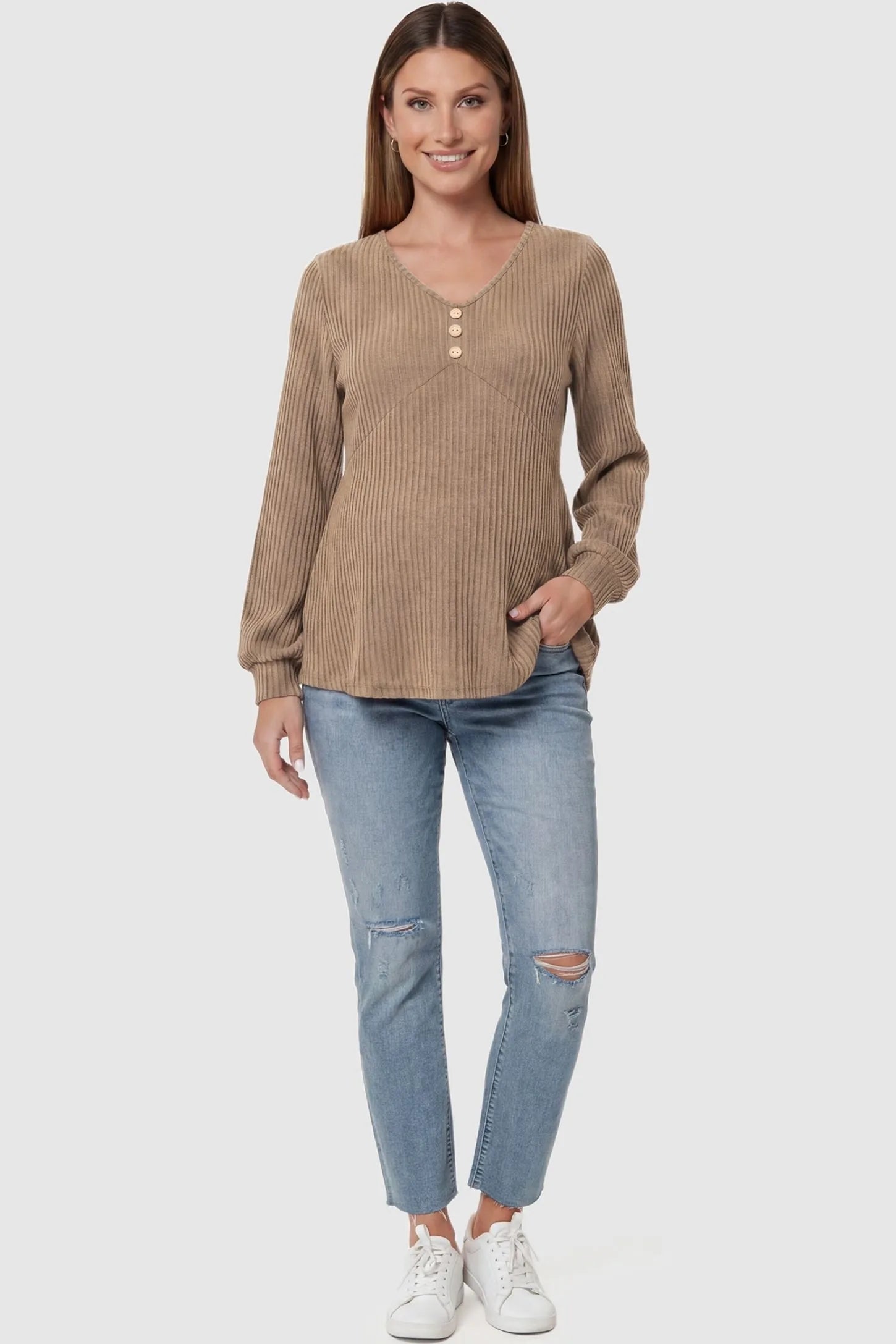 Ribbed Knit Empire Waist Maternity Top Ribbed Knit Empire Waist Maternity Top in khaki featuring a v-neckline and ribbed knit texture on a pregnant model front view.
