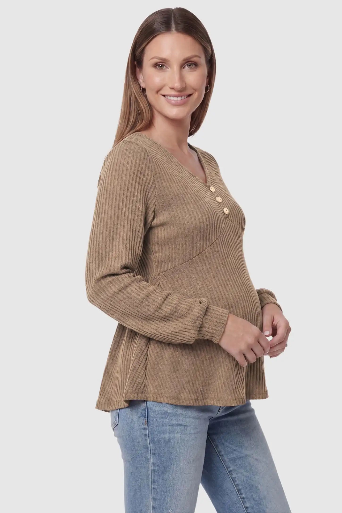Ribbed Knit Empire Waist Maternity Top Ribbed Knit Empire Waist Maternity Top in khaki featuring a v-neckline and ribbed knit texture on a pregnant model side view.
