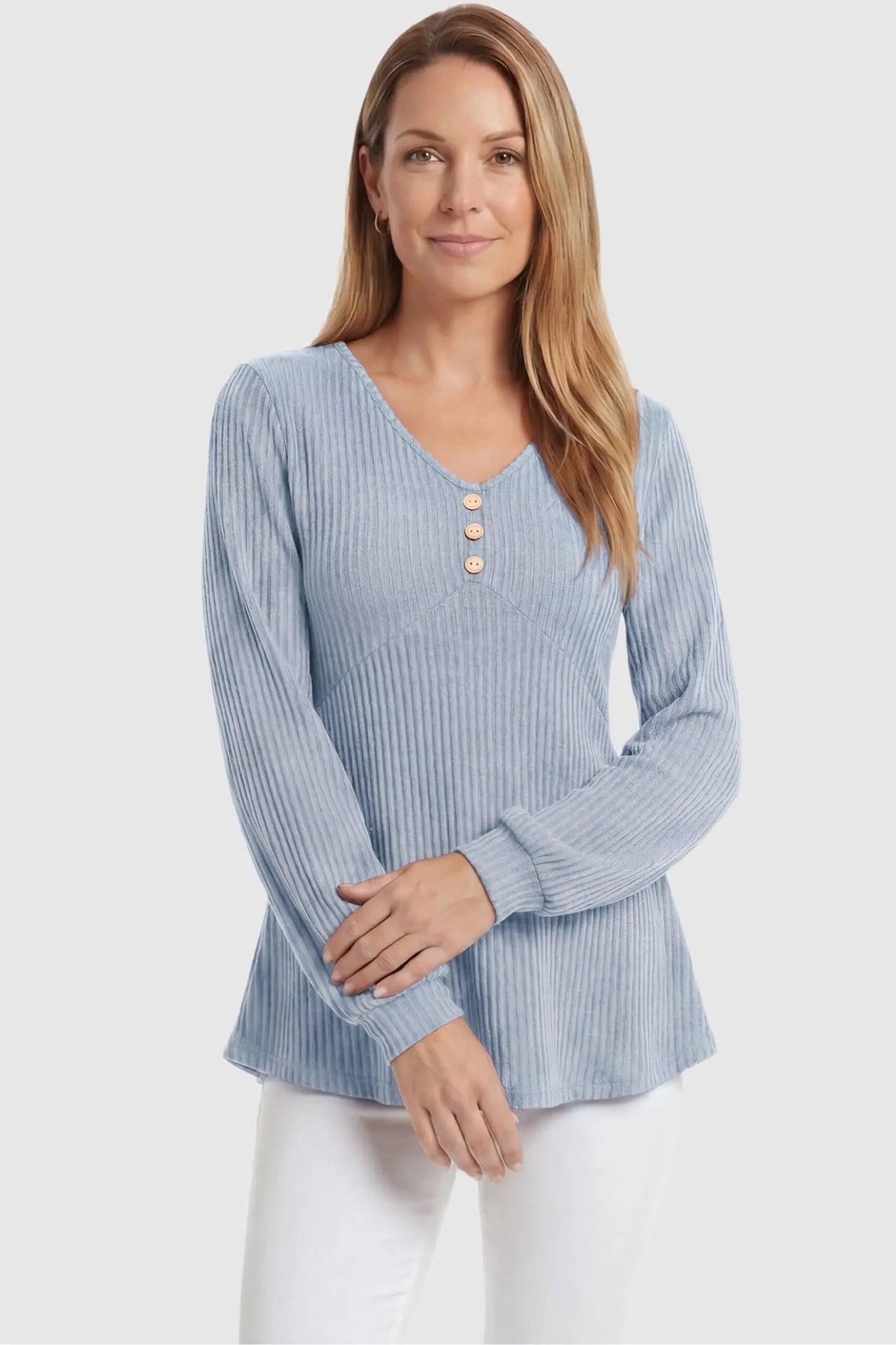 Ribbed Knit Empire Waist Maternity Top Ribbed Knit Empire Waist Maternity Top in light blue featuring a v-neckline and ribbed knit texture on a non-pregnant model front view.