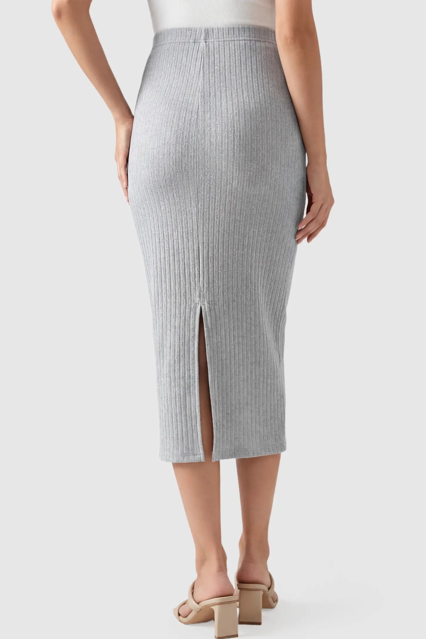 Ribbed Knit High Waist Maternity Skirt Ribbed Knit High Waist Maternity Skirt in Gray featuring a vertical ribbed texture on a pregnant model showing back.