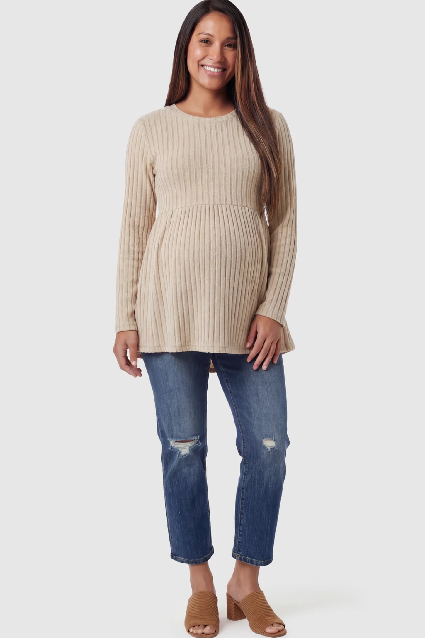 Ribbed Knit Long Sleeve Maternity Top Ribbed Knit Long Sleeve Maternity Top in Khali featuring an empire waist and high-stretch fabric on a pregnant model.