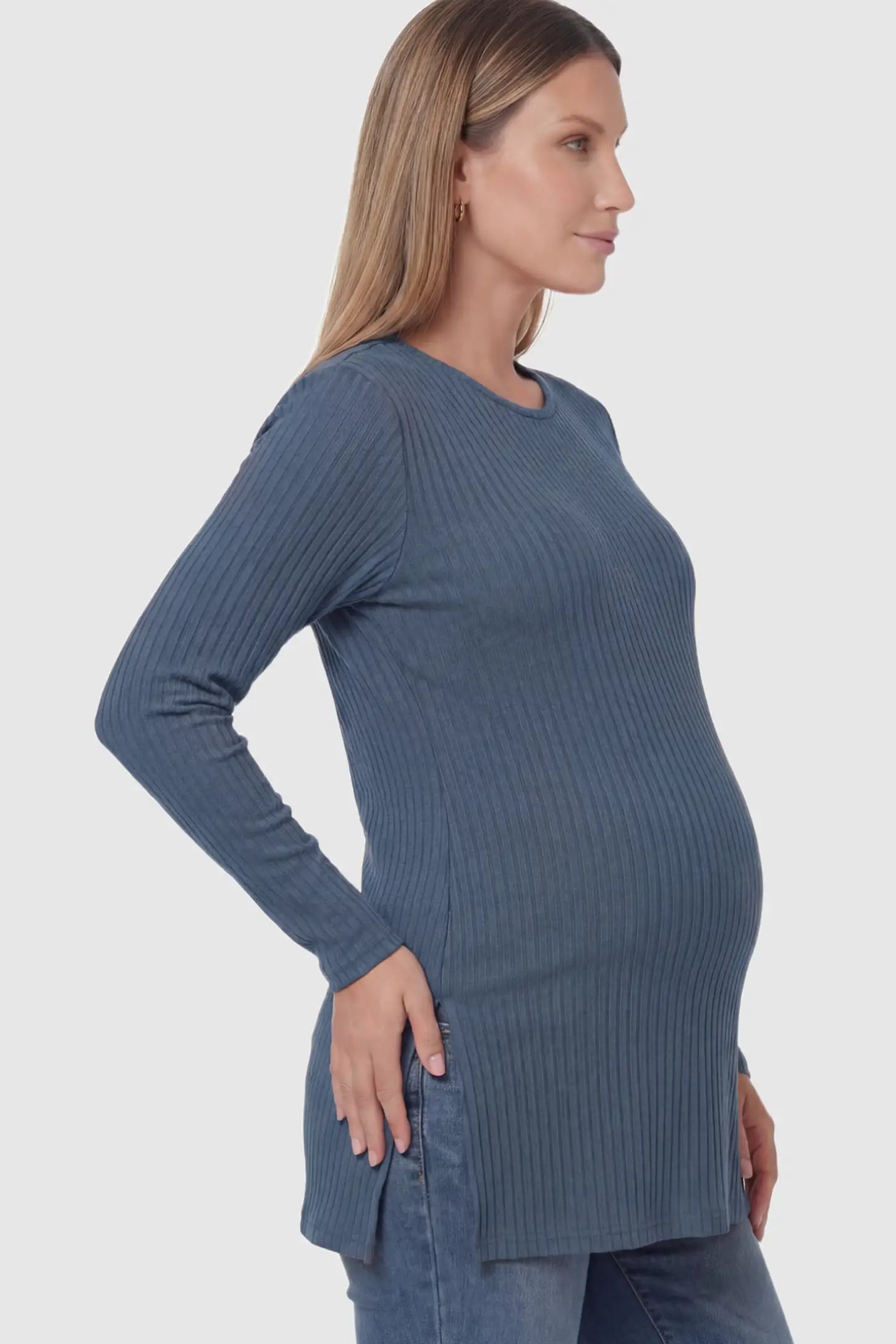 Ribbed Knit Long Sleeve Side Slit Maternity Top Ribbed Knit Side Slit Maternity Top in Blue featuring high-stretch fabric and tunic length on a pregnant model showing side.