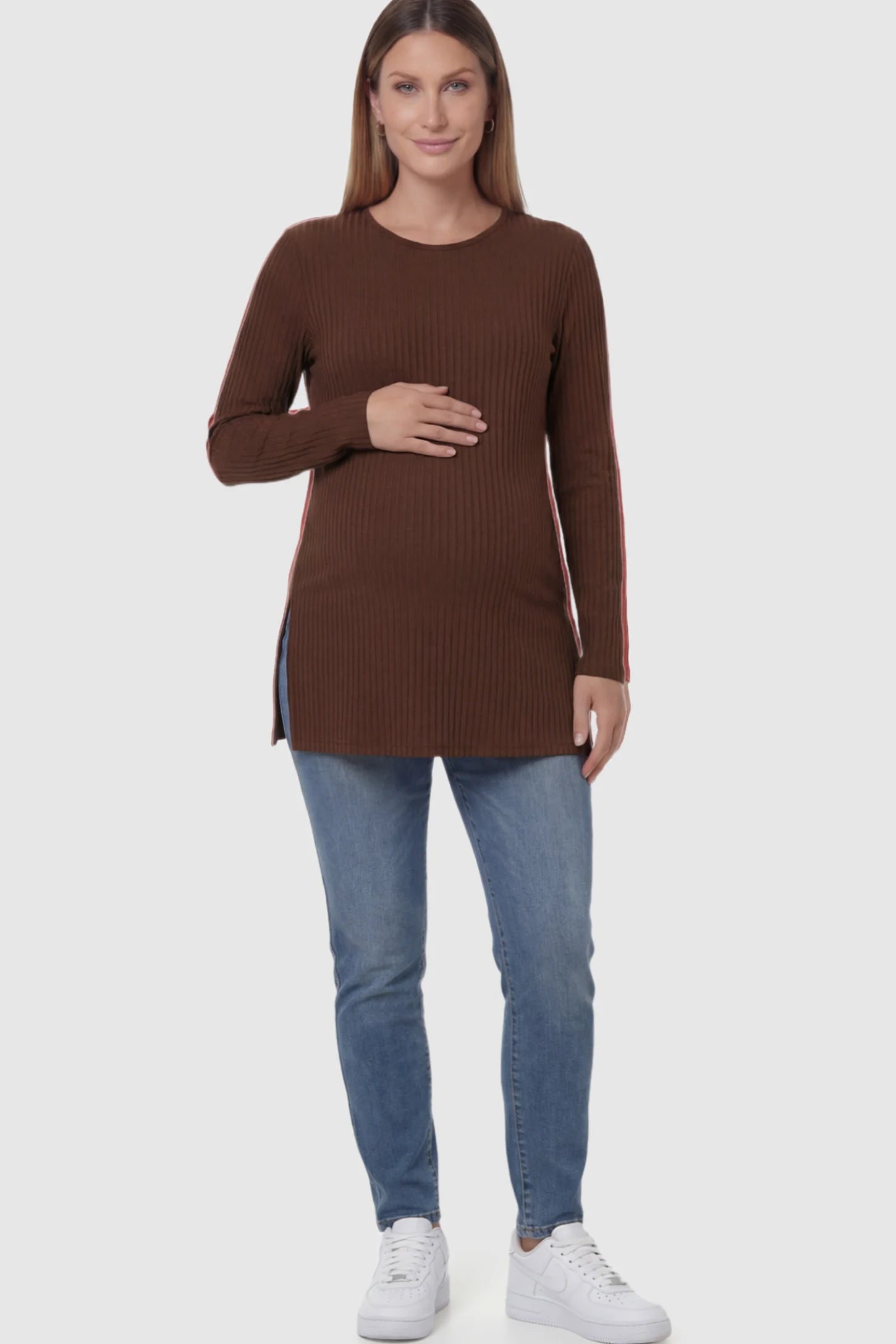 Ribbed Knit Long Sleeve Side Slit Maternity Top Ribbed Knit Side Slit Maternity Top in Dark Brown featuring high-stretch fabric and tunic length on a pregnant model showing front.