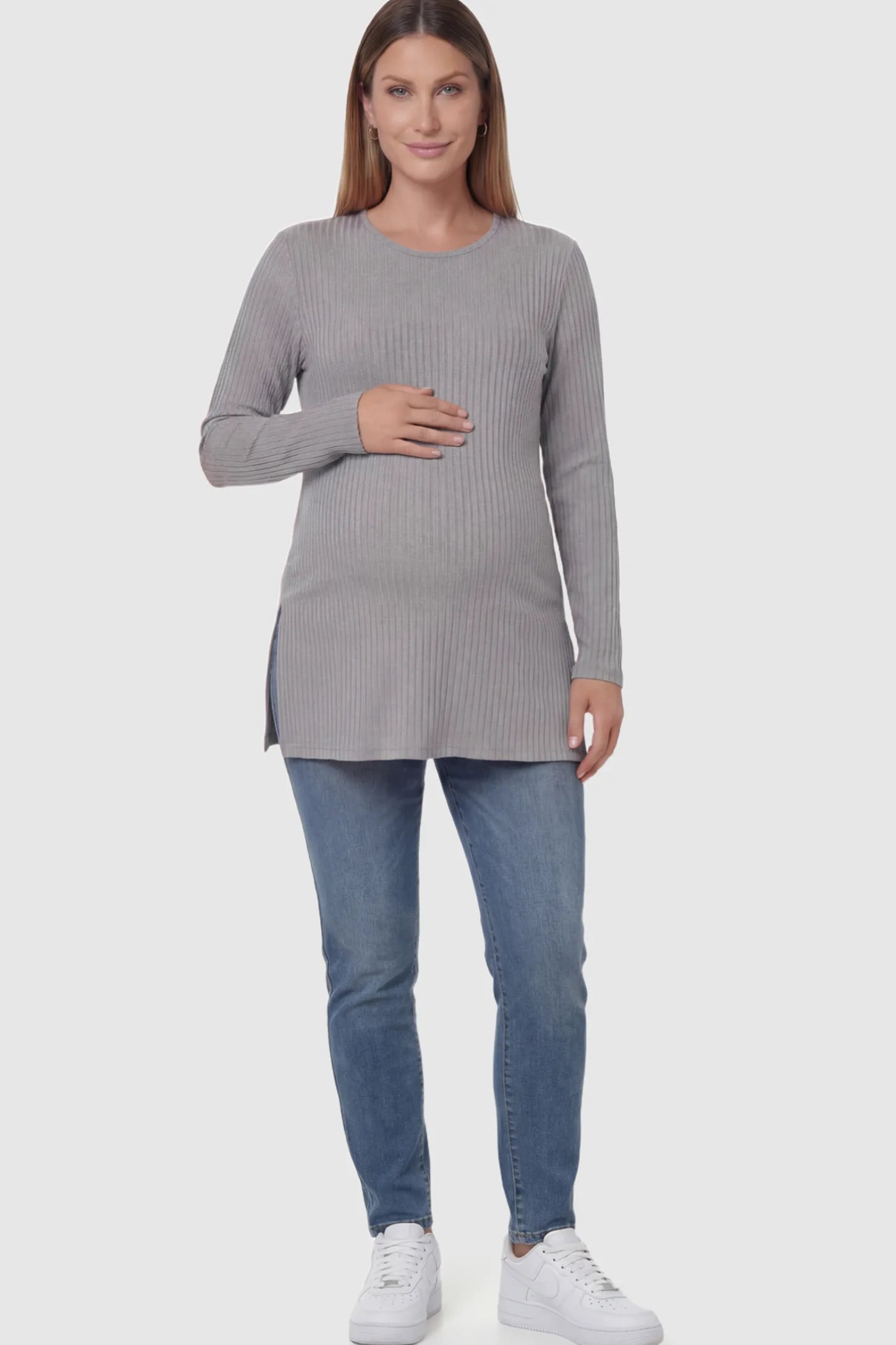 Ribbed Knit Long Sleeve Side Slit Maternity Top Ribbed Knit Side Slit Maternity Top in Gray featuring high-stretch fabric and tunic length on a pregnant model showing front.