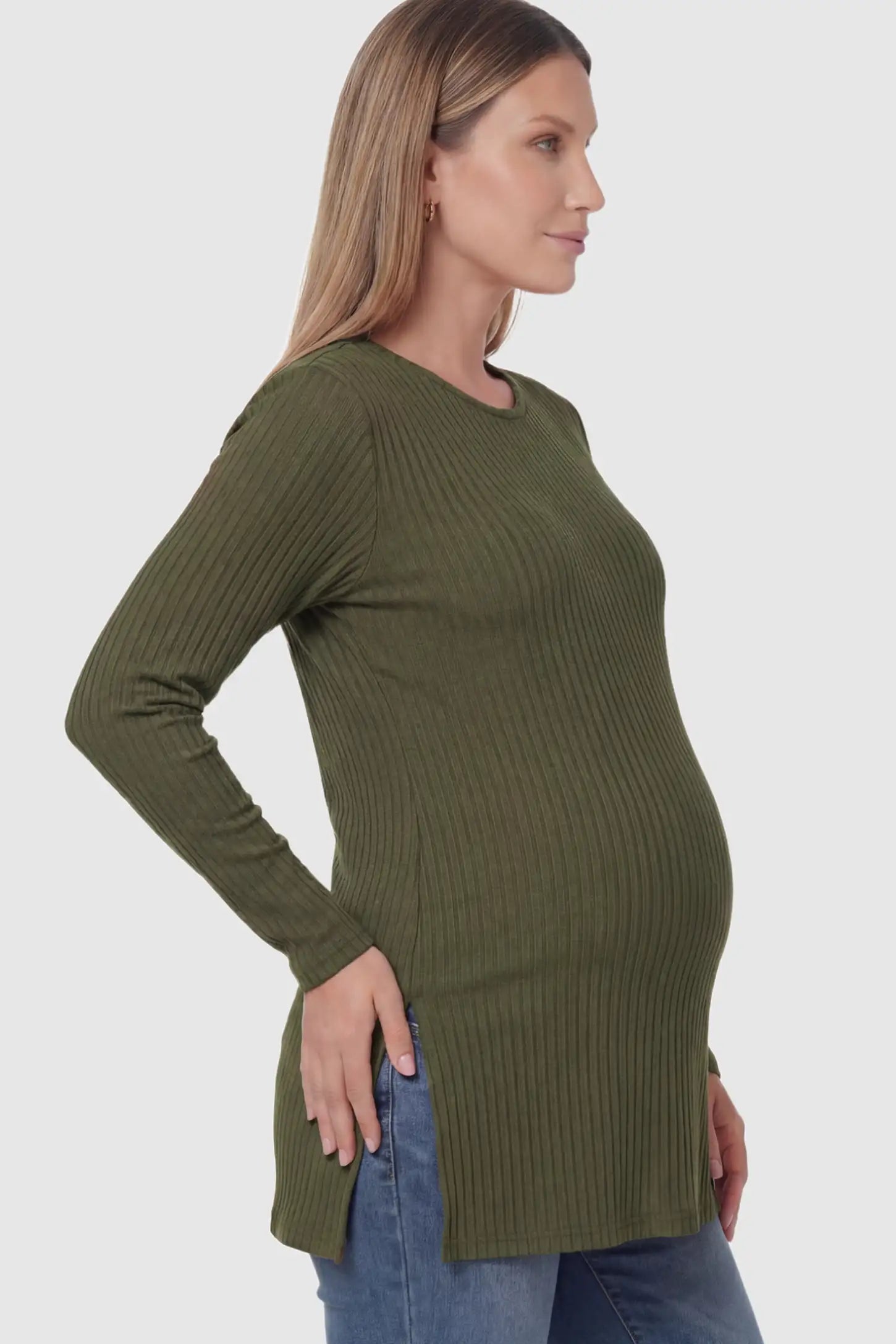 Ribbed Knit Long Sleeve Side Slit Maternity Top Ribbed Knit Side Slit Maternity Top in Green featuring high-stretch fabric and tunic length on a pregnant model showing side.