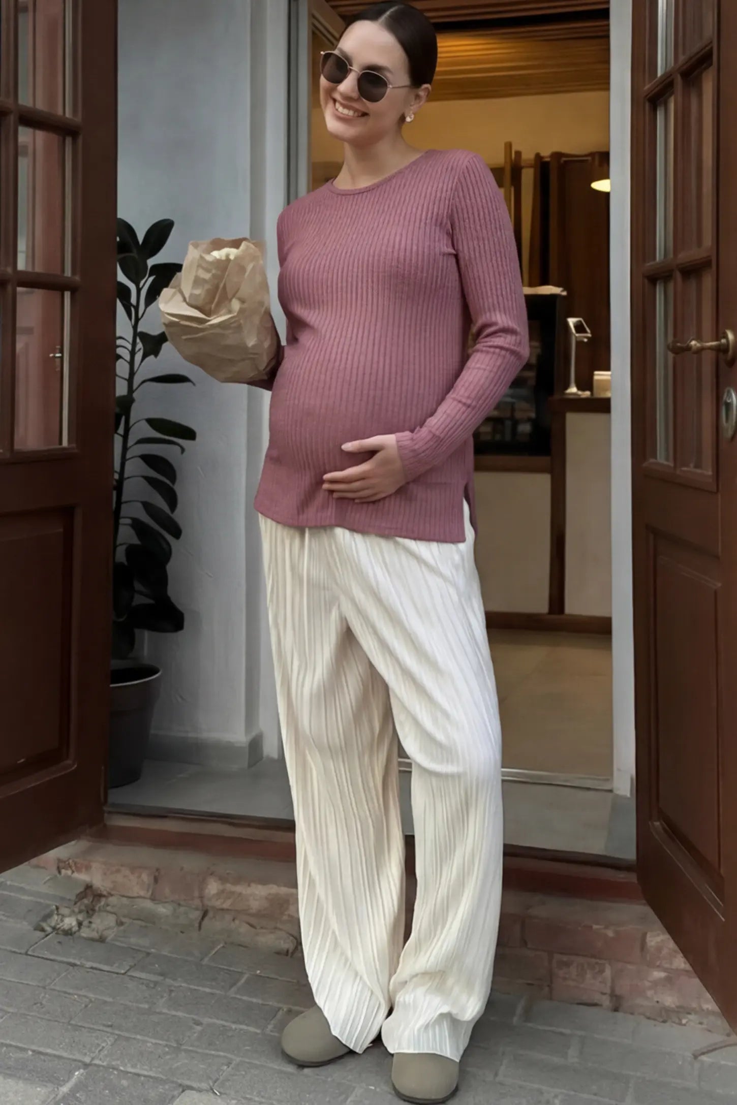 Ribbed Knit Long Sleeve Side Slit Maternity Top Ribbed Knit Side Slit Maternity Top in Pink featuring high-stretch fabric and tunic length on a pregnant woman.