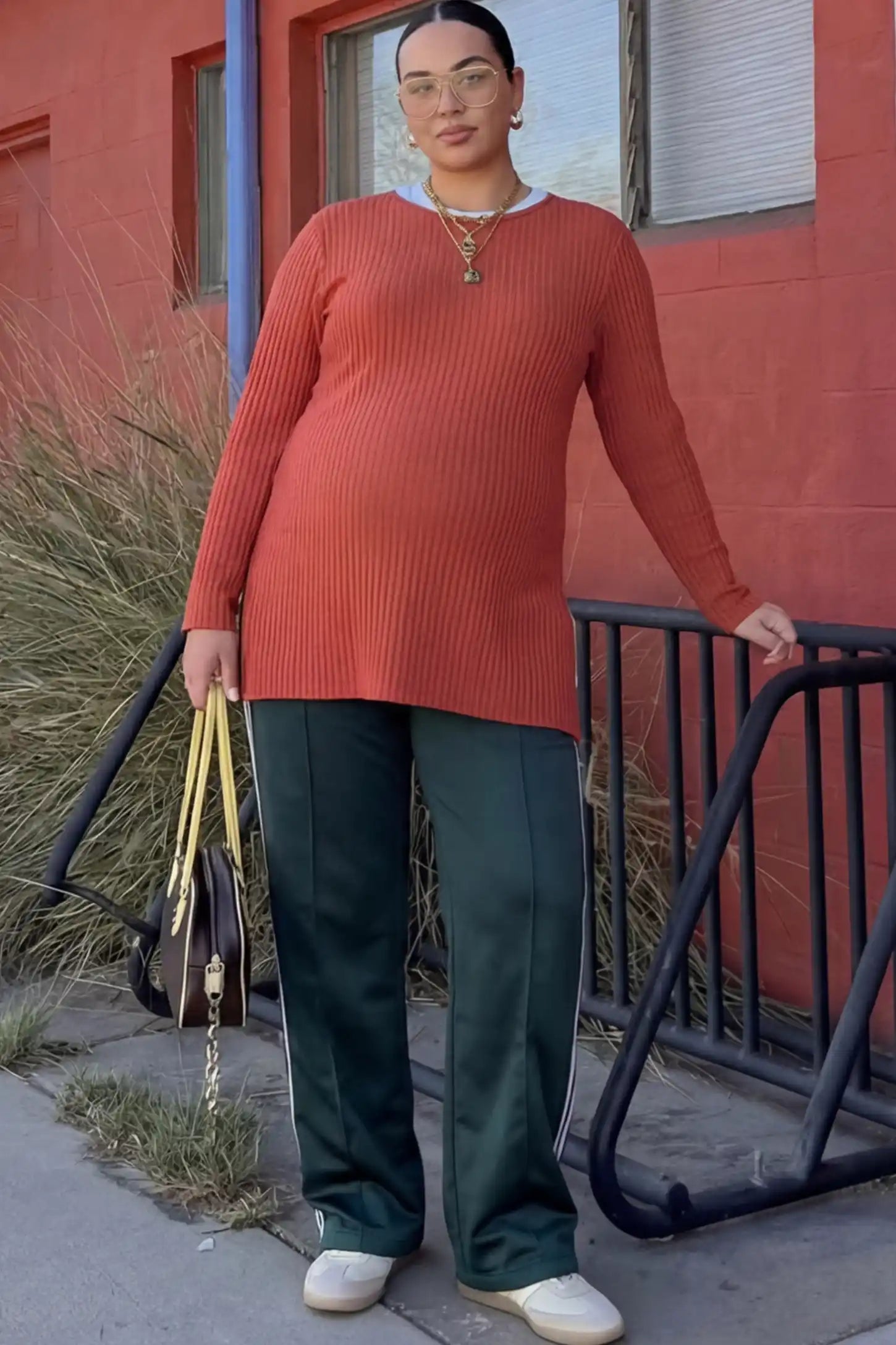 Ribbed Knit Long Sleeve Side Slit Maternity Top Ribbed Knit Side Slit Maternity Top in Red featuring high-stretch fabric and tunic length on a pregnant woman.
