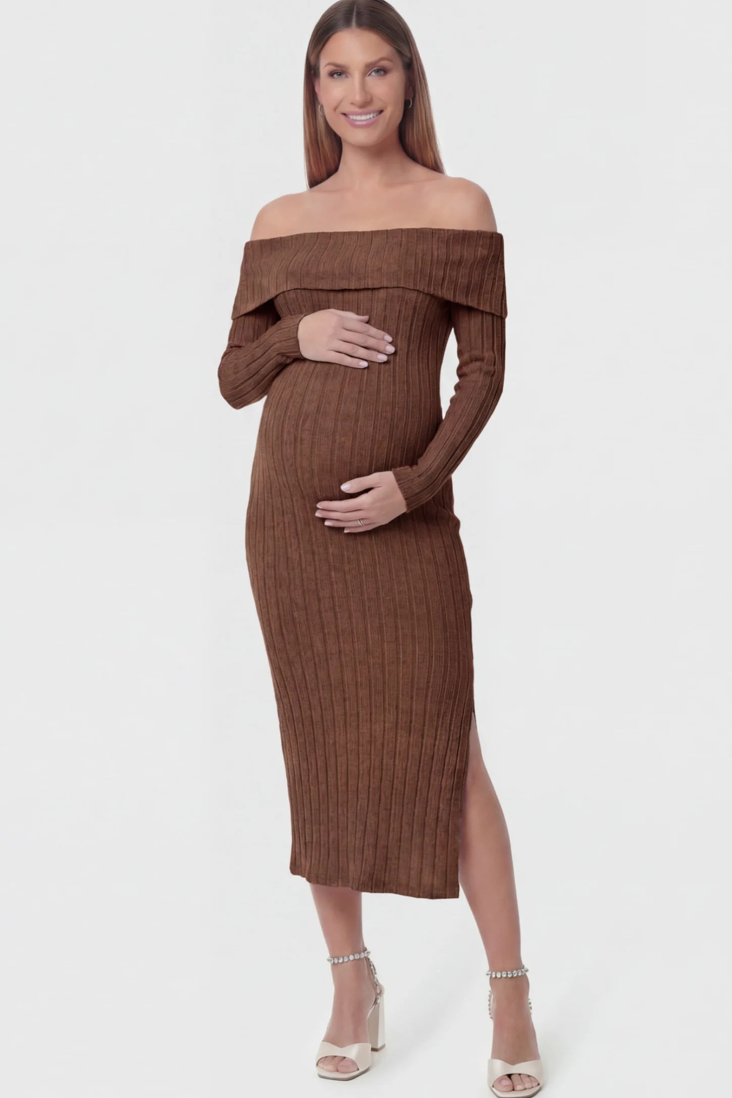 Ribbed Knit Off Shoulder Side Slit Maternity Midi Dress Ribbed Knit Side Slit Off Shoulder Maternity Midi Dress in Brown featuring a fold-over neckline on a pregnant model showing front.